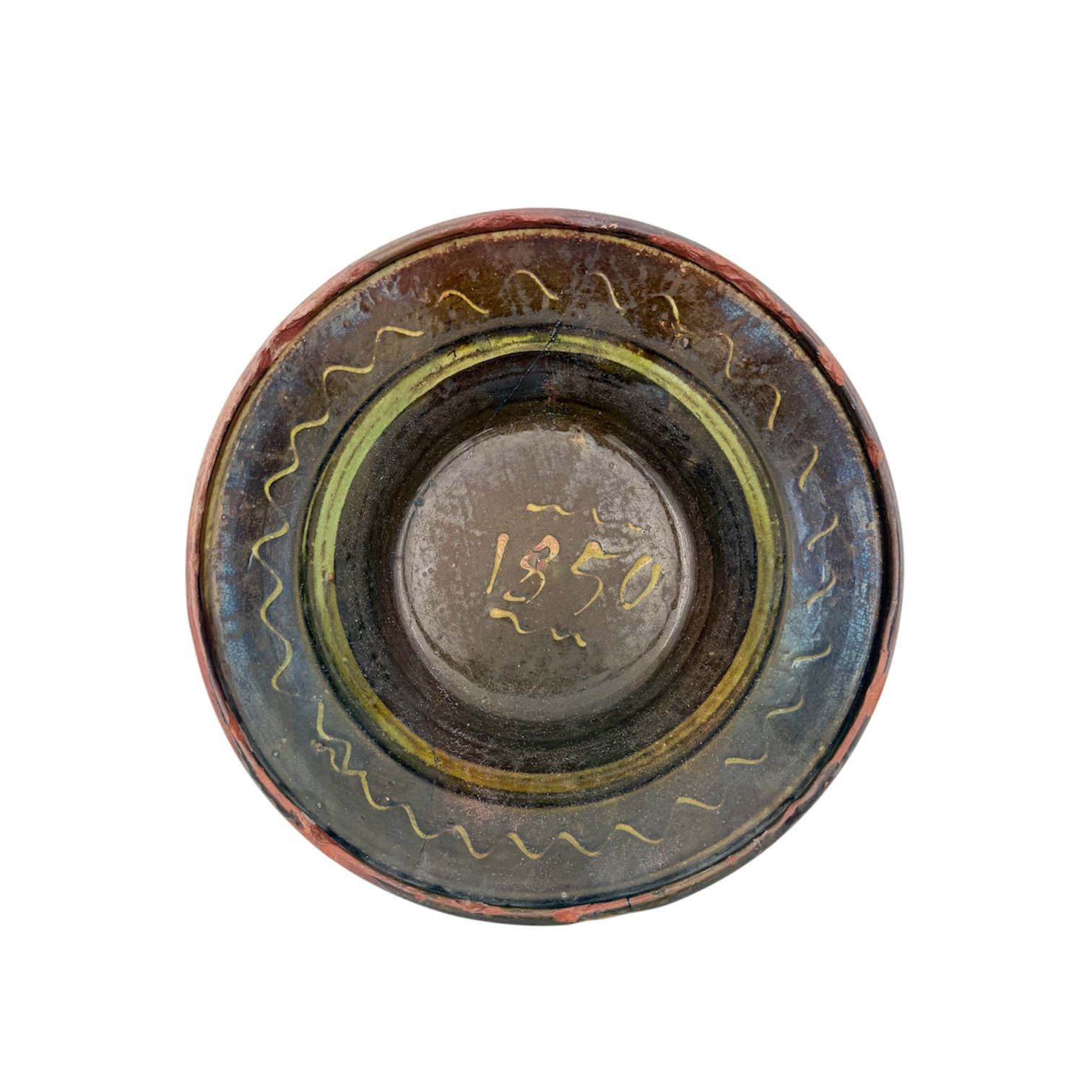 SKÅL, 1800-tal, södra Sverige, möjligen s ka äggakagefat, engoberad och delvis glaserad keramik, daterad 1850, dekor av linjer bl a vågformad.