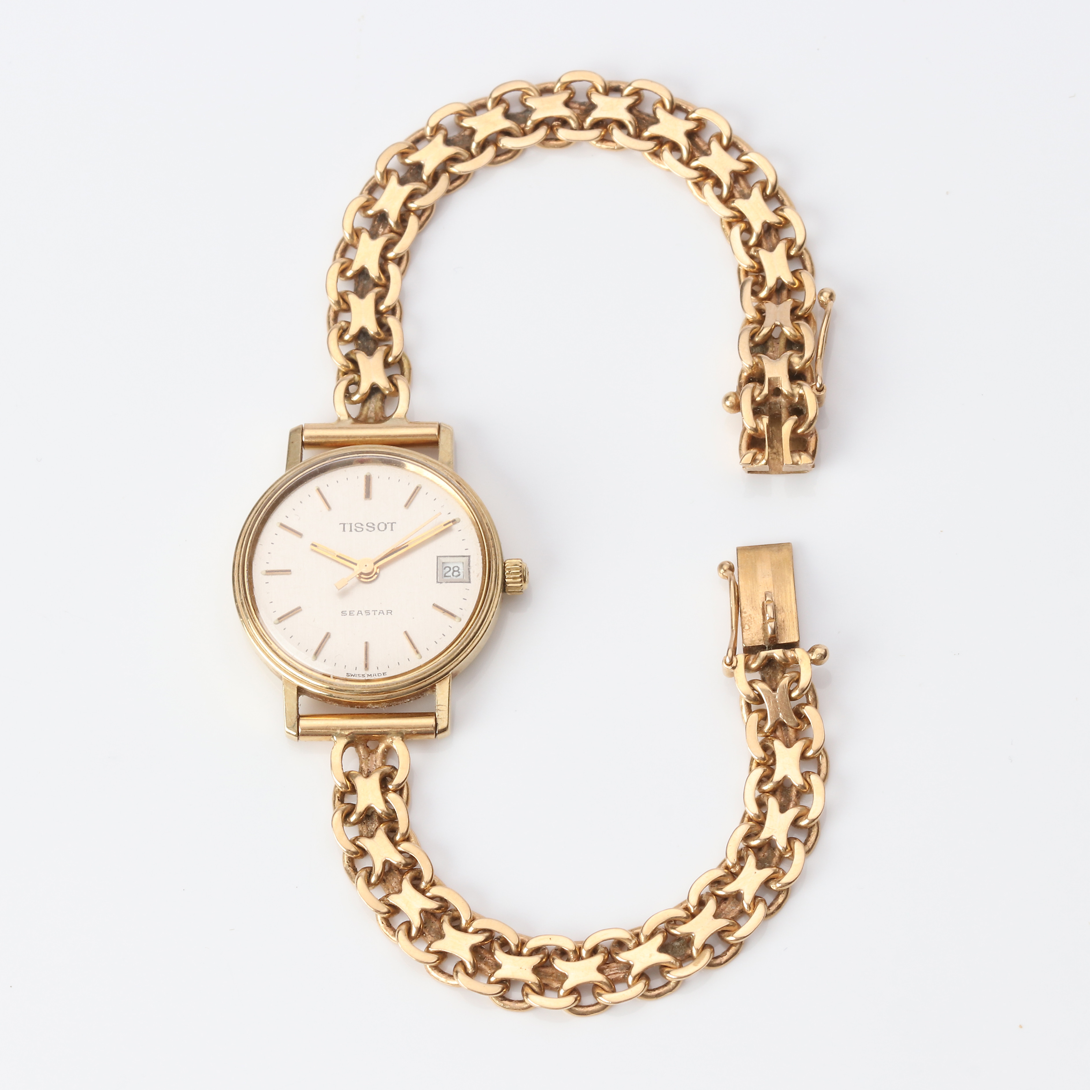 TISSOT SEASTAR, DAMARMBANDSUR. Boett i 14k guld, länk i 18k guld, totalvikt ca 22,2 gram.