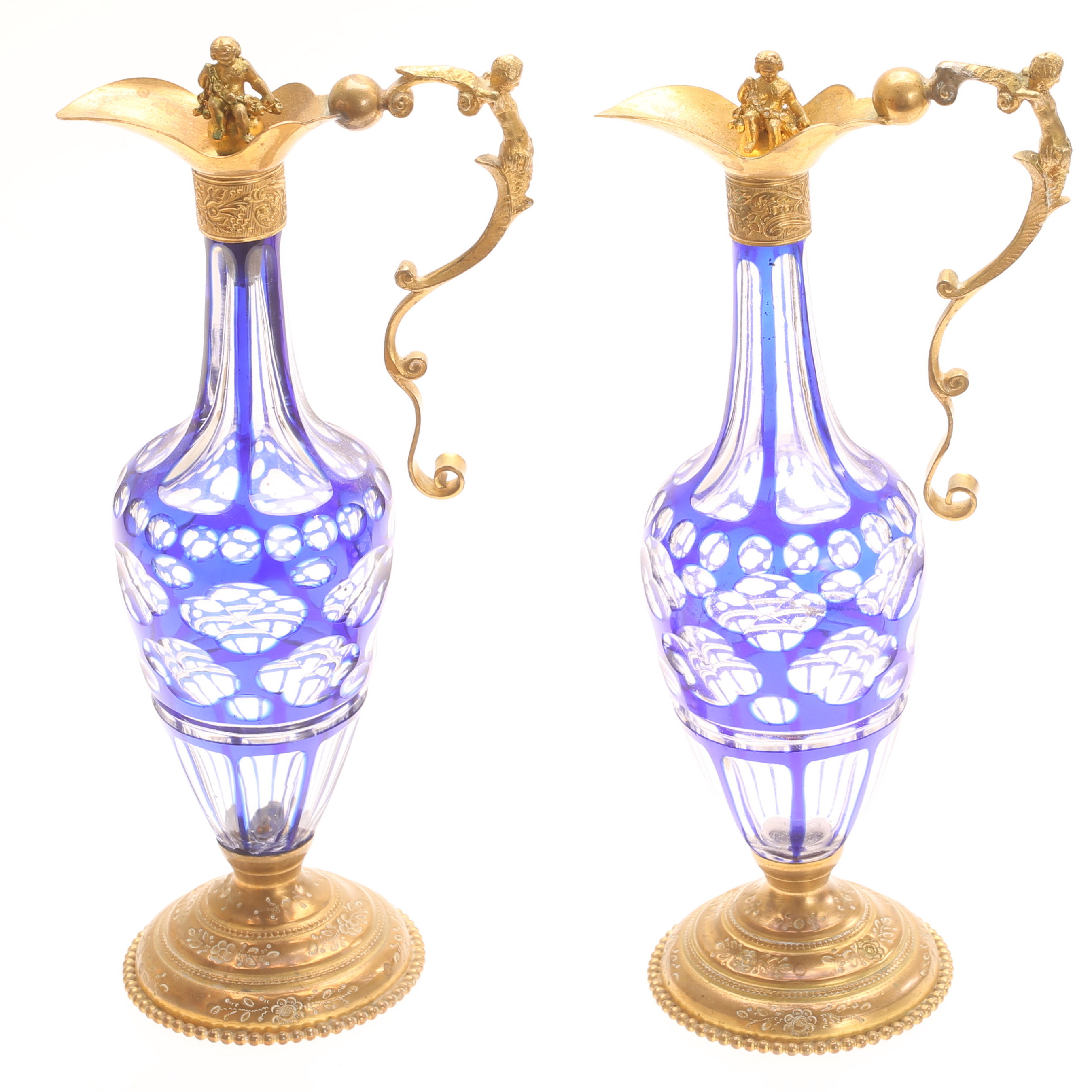 KARAFFER, 2 stycken, glas och mässing, 1800-tal.