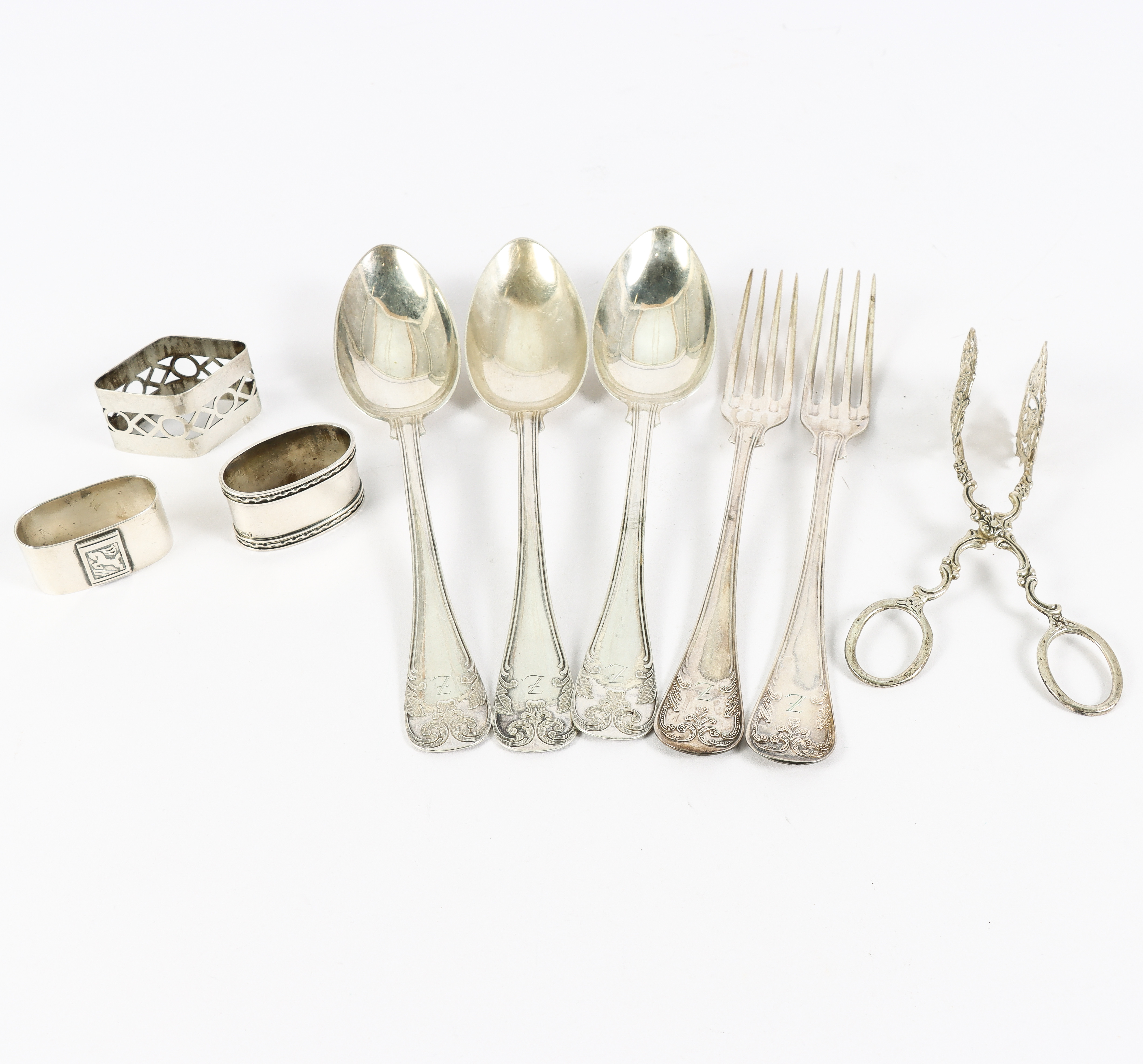SILVER, bestick och servettringar, 9 delar.