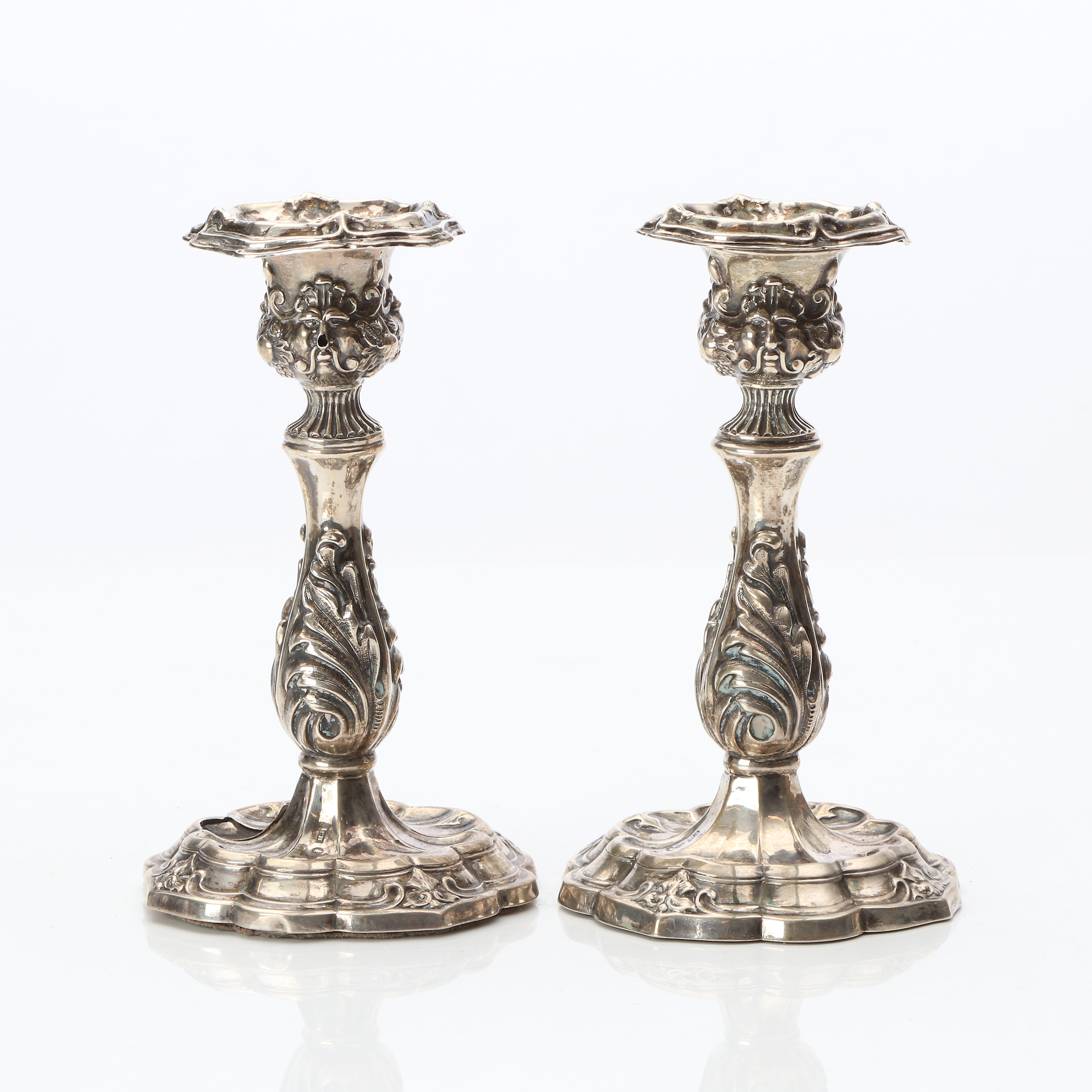 LJUSSTAKAR, ETT PAR. Silver. Christian Hammer, 1860, Stockholm. Fyllda i foten.