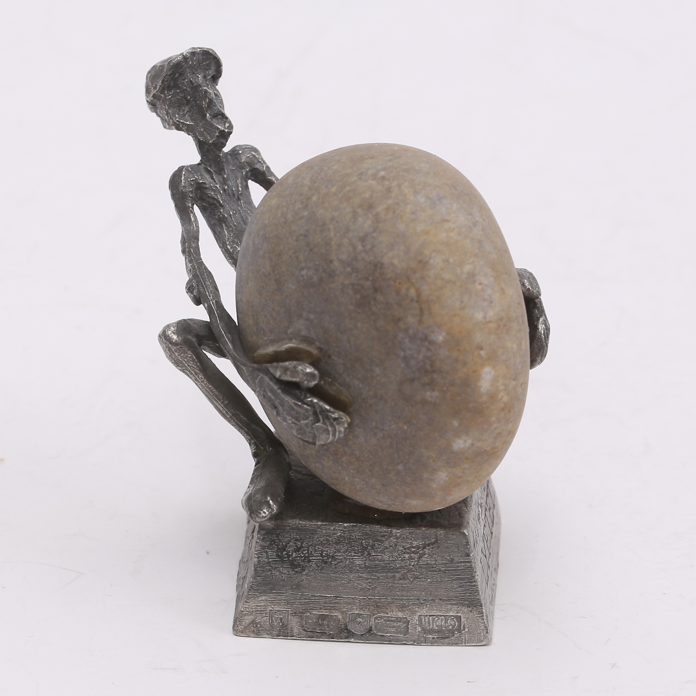 HENRY GUSTAFSSON. Skulptur, "Lyftet", sten och tenn.