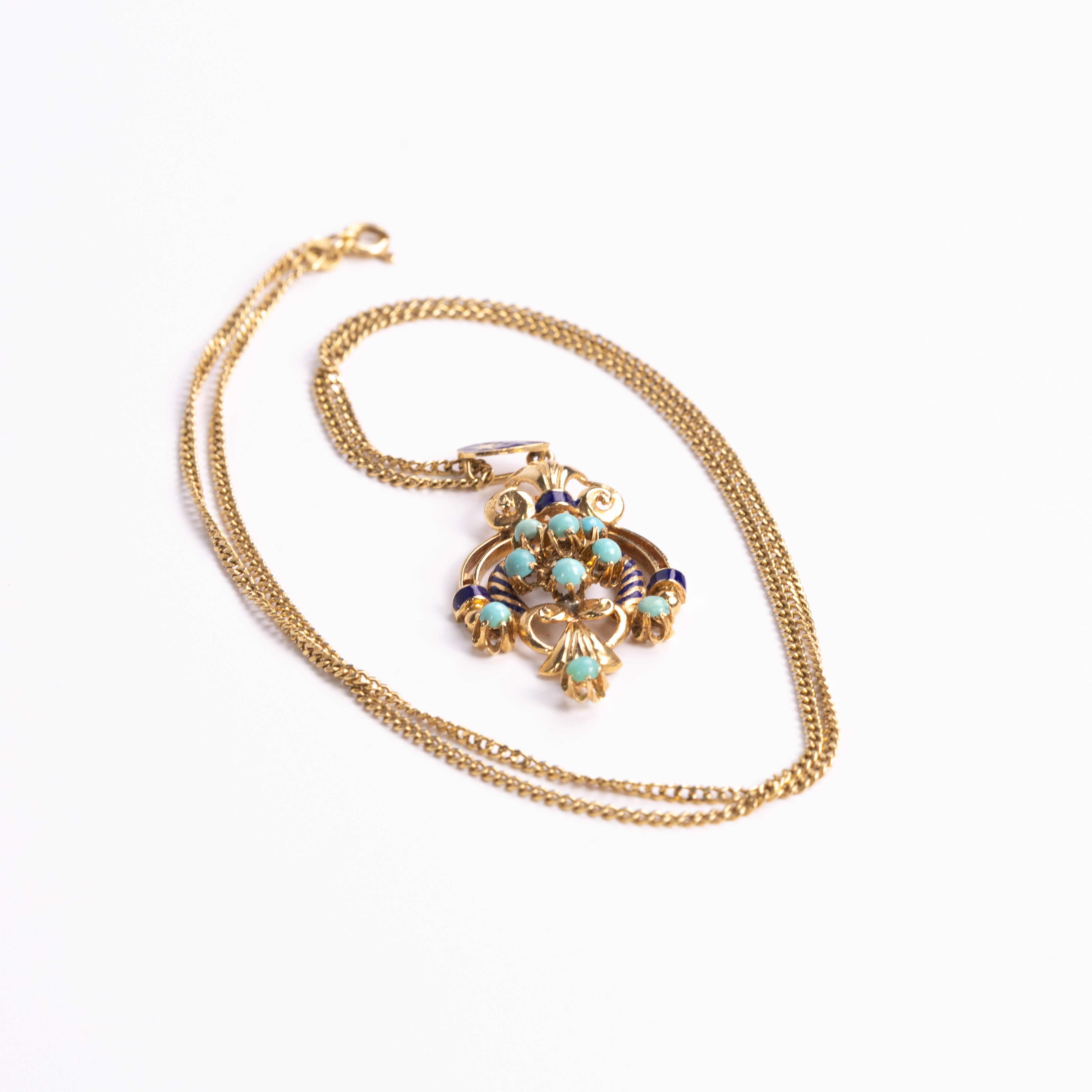 HALSBAND MED HÄNGE. 18k guld.