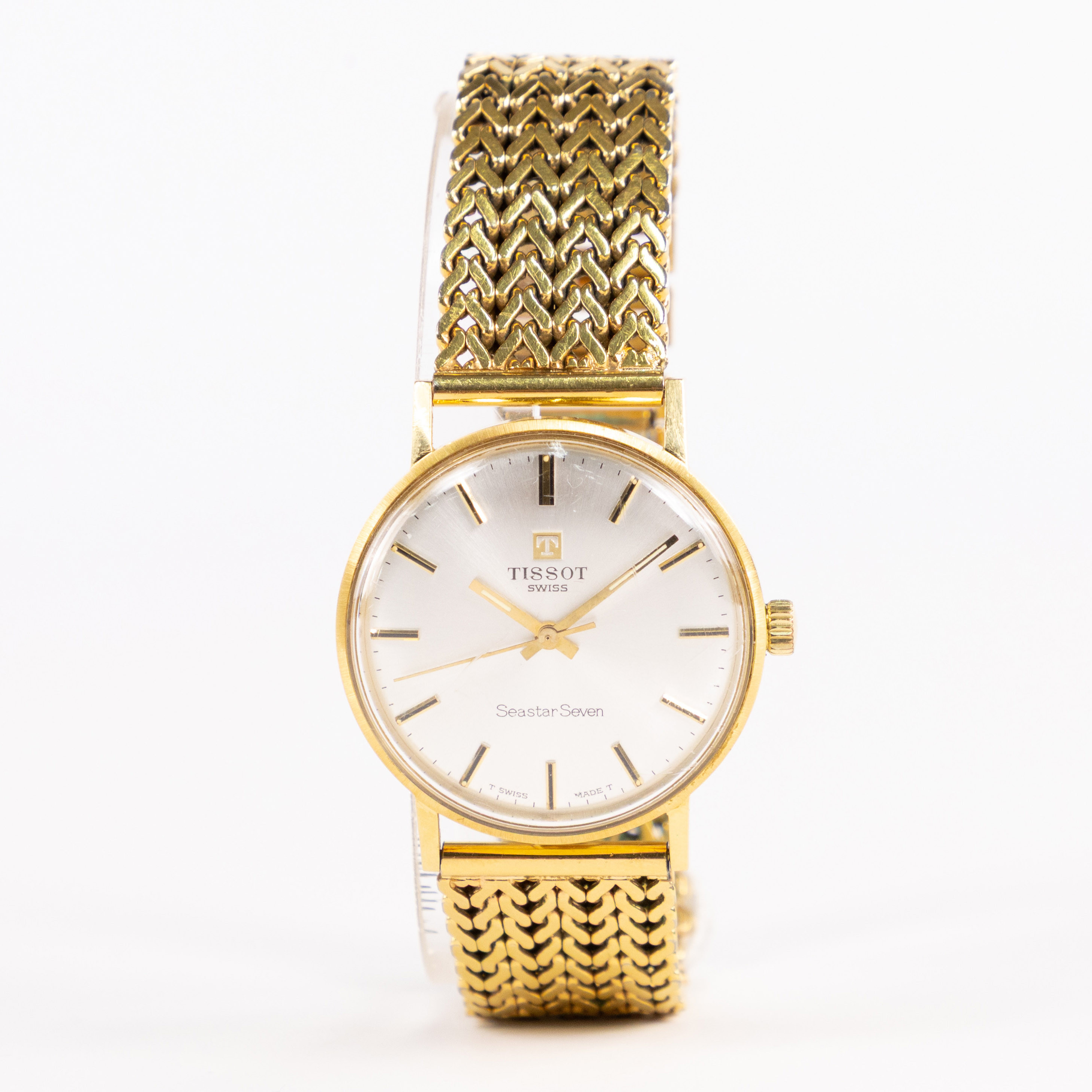 TISSOT. Seastar Seven, 33 mm, 18k guld.
