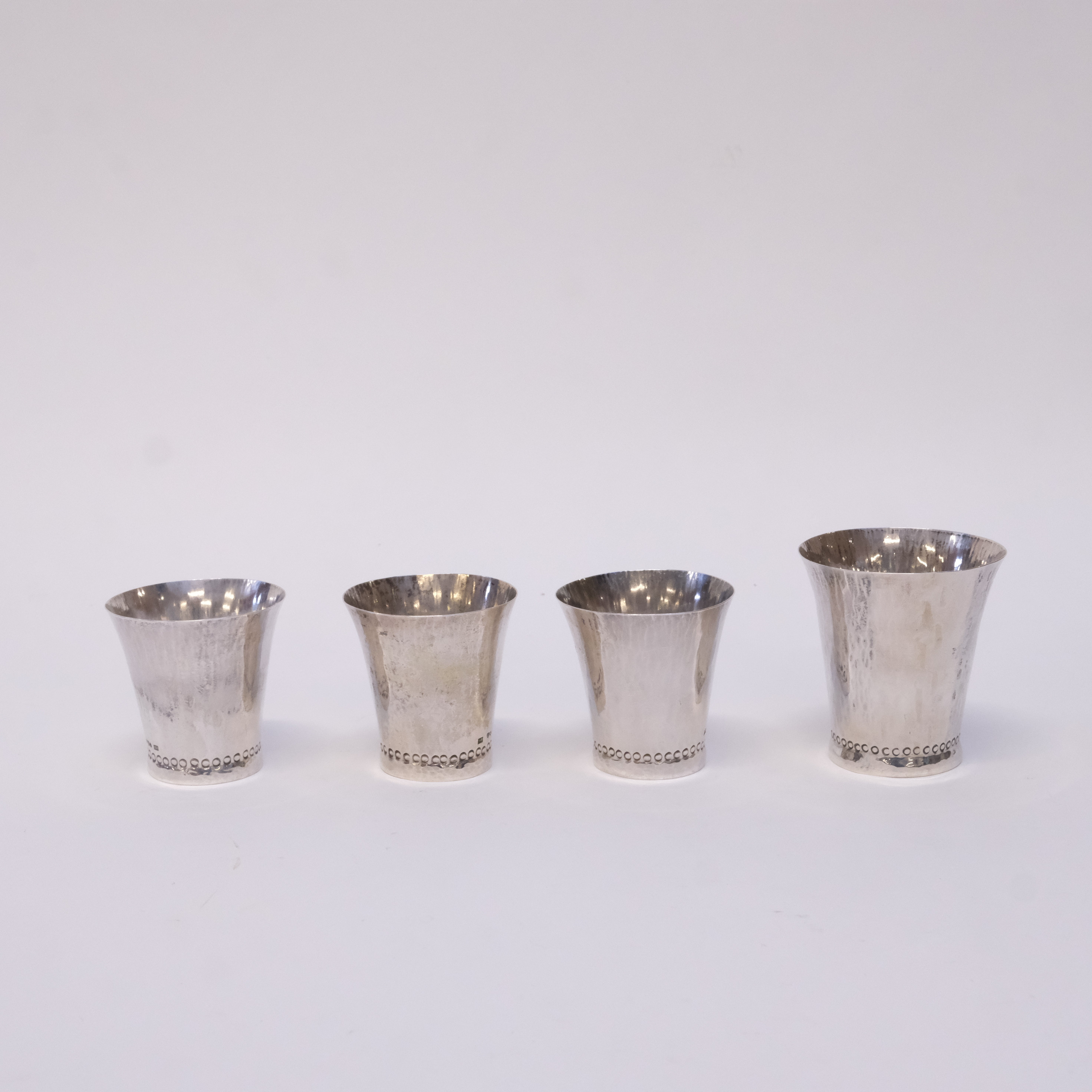 FYRA MYNTBÄGARE, SILVER.