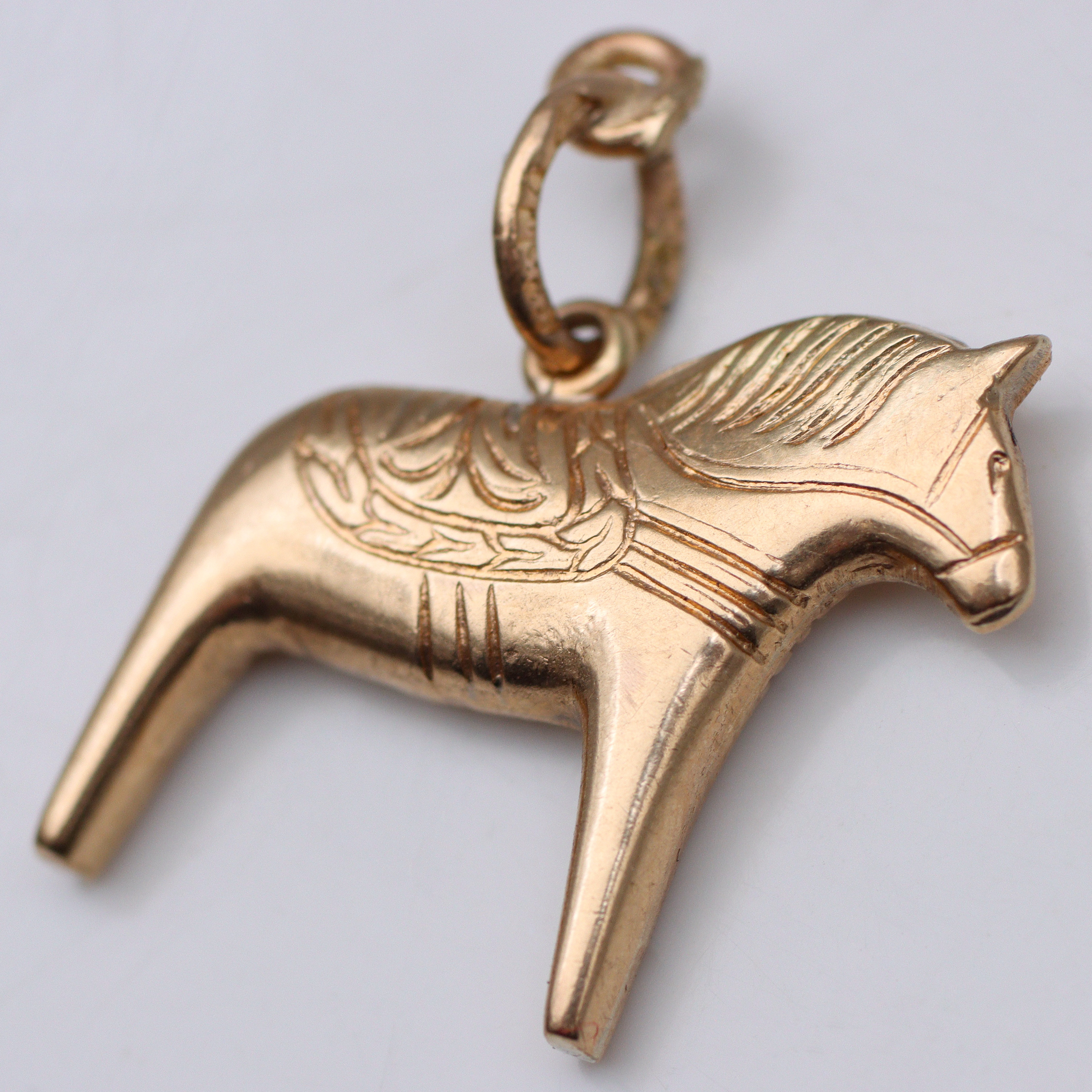 BERLOCK 18K GULD.