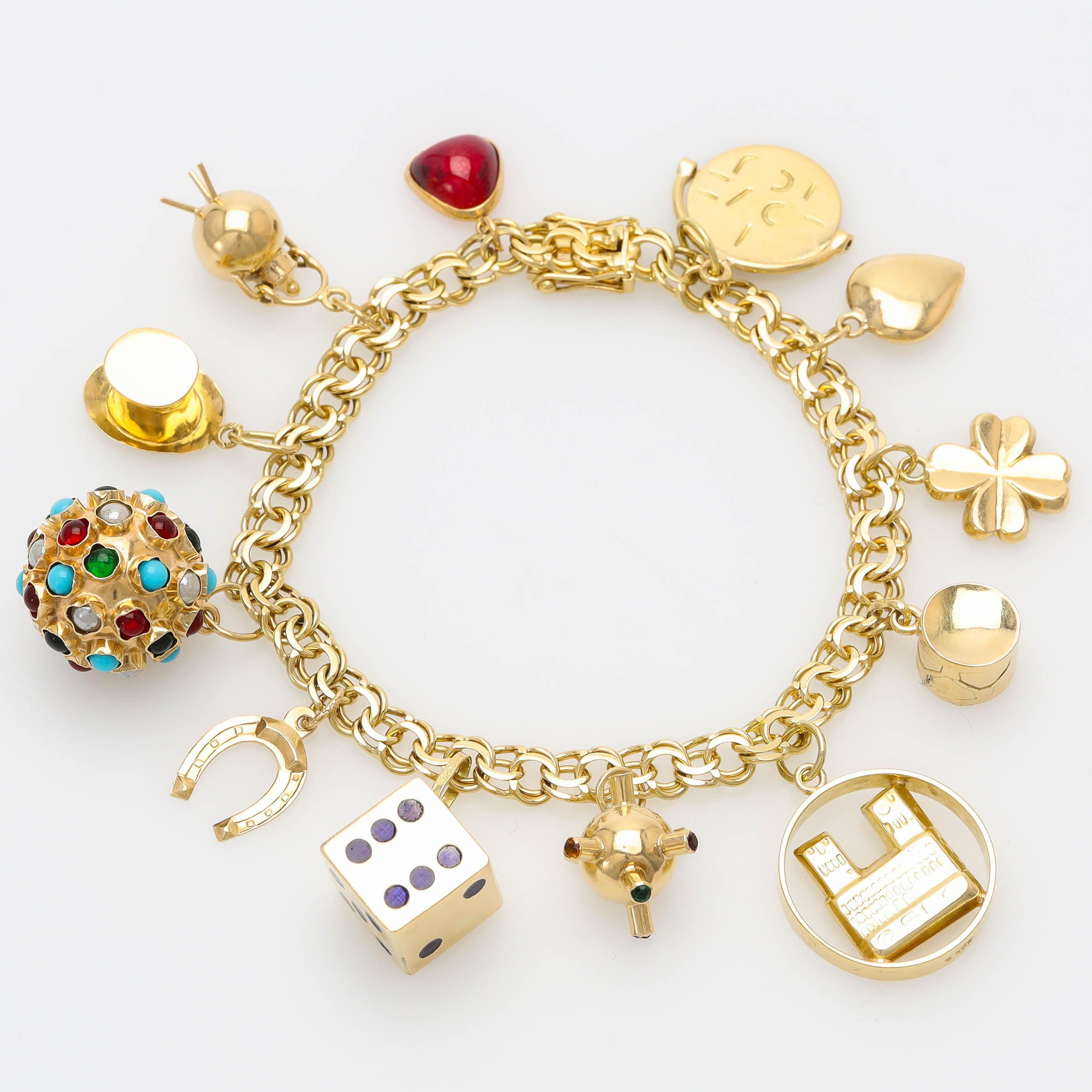 ARMBAND, 14 k guld, bismarcklänk med 12 berlocker.