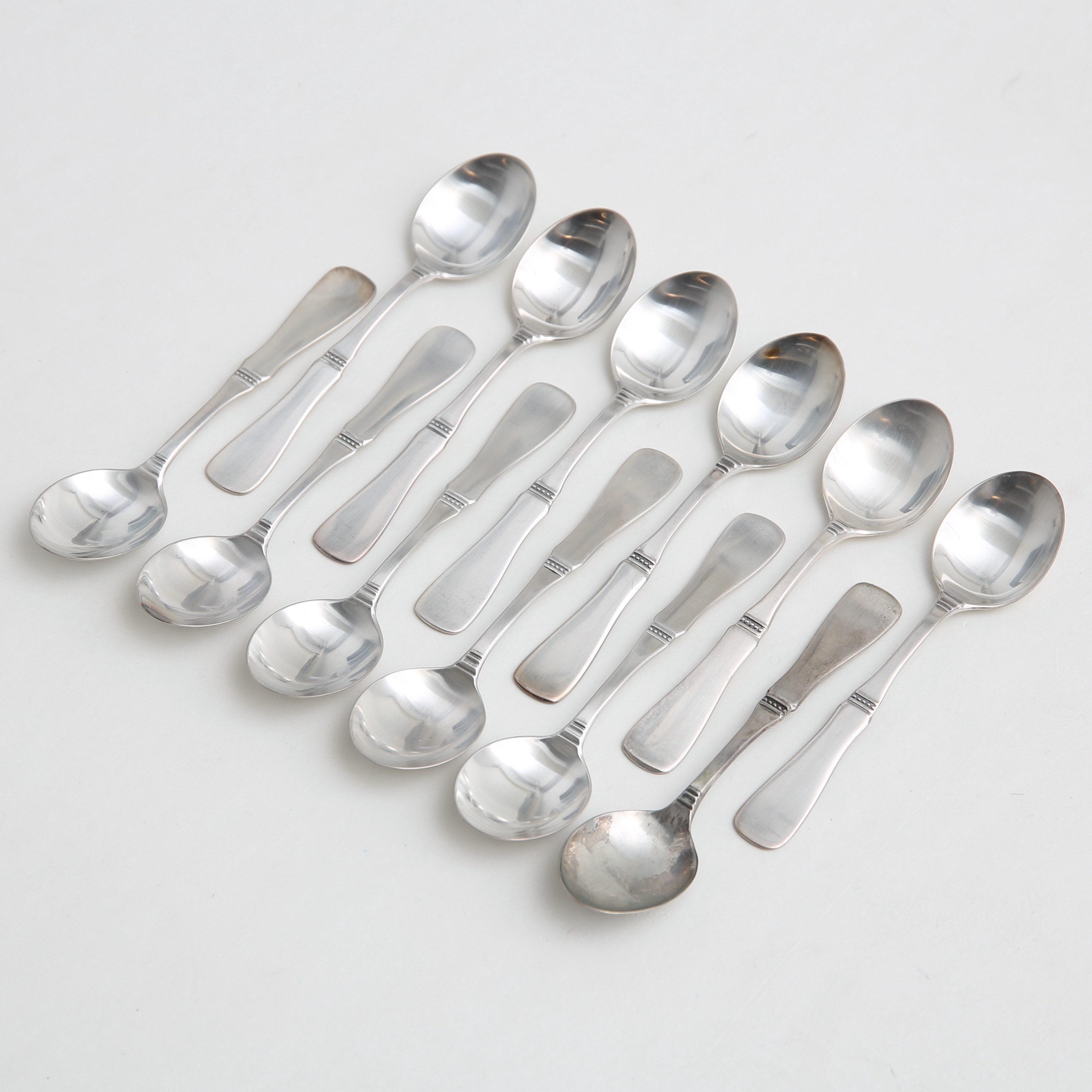 ERIC LÖFMAN. Kaffeskedar, 12 st, "Uppsala", silver, MGAB, 830, vikt 168 gram.