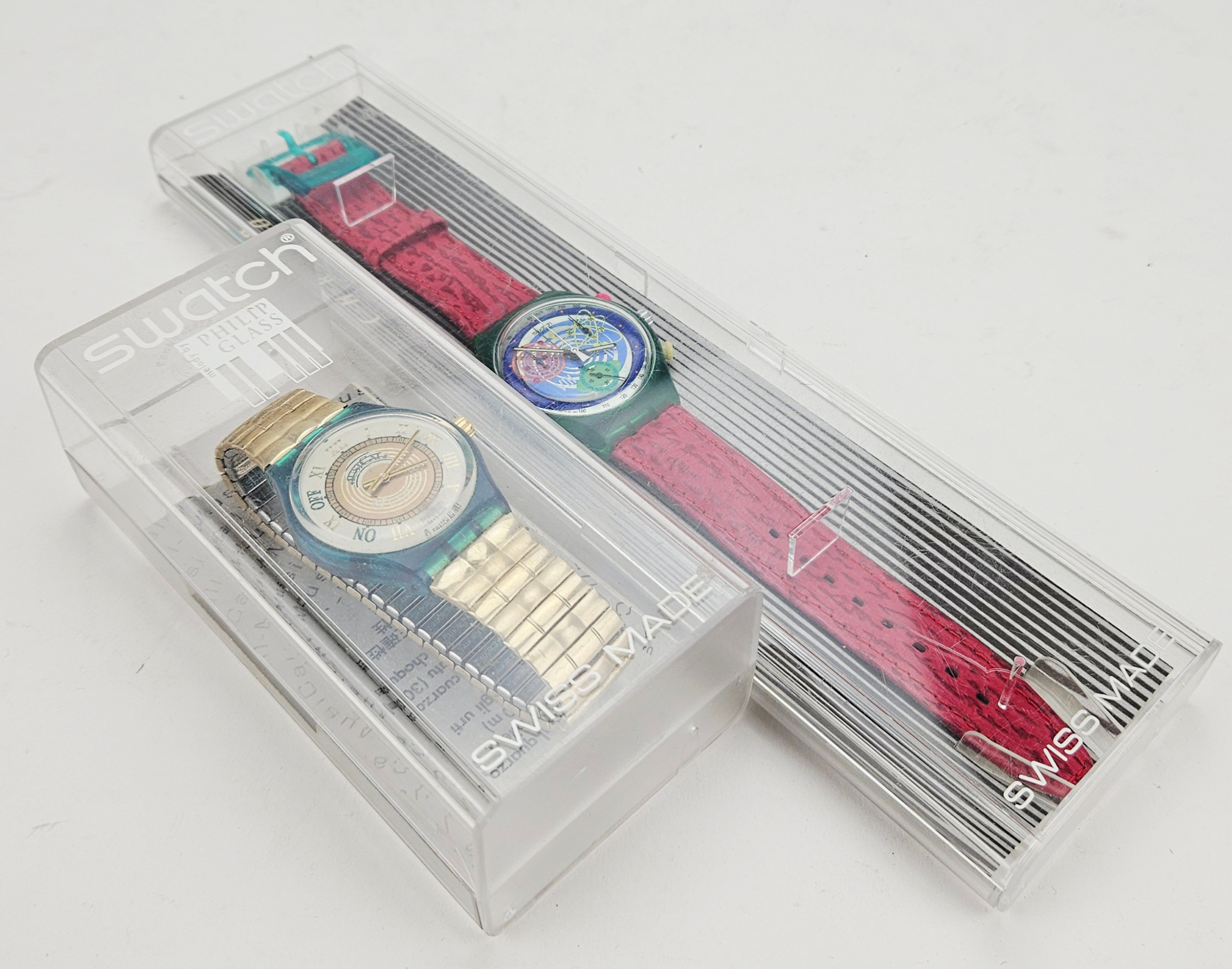SWATCH. Armbandsur, 2 st. Chromo, "Pink Springs" och Musicall, Martingala, 1990-tal.