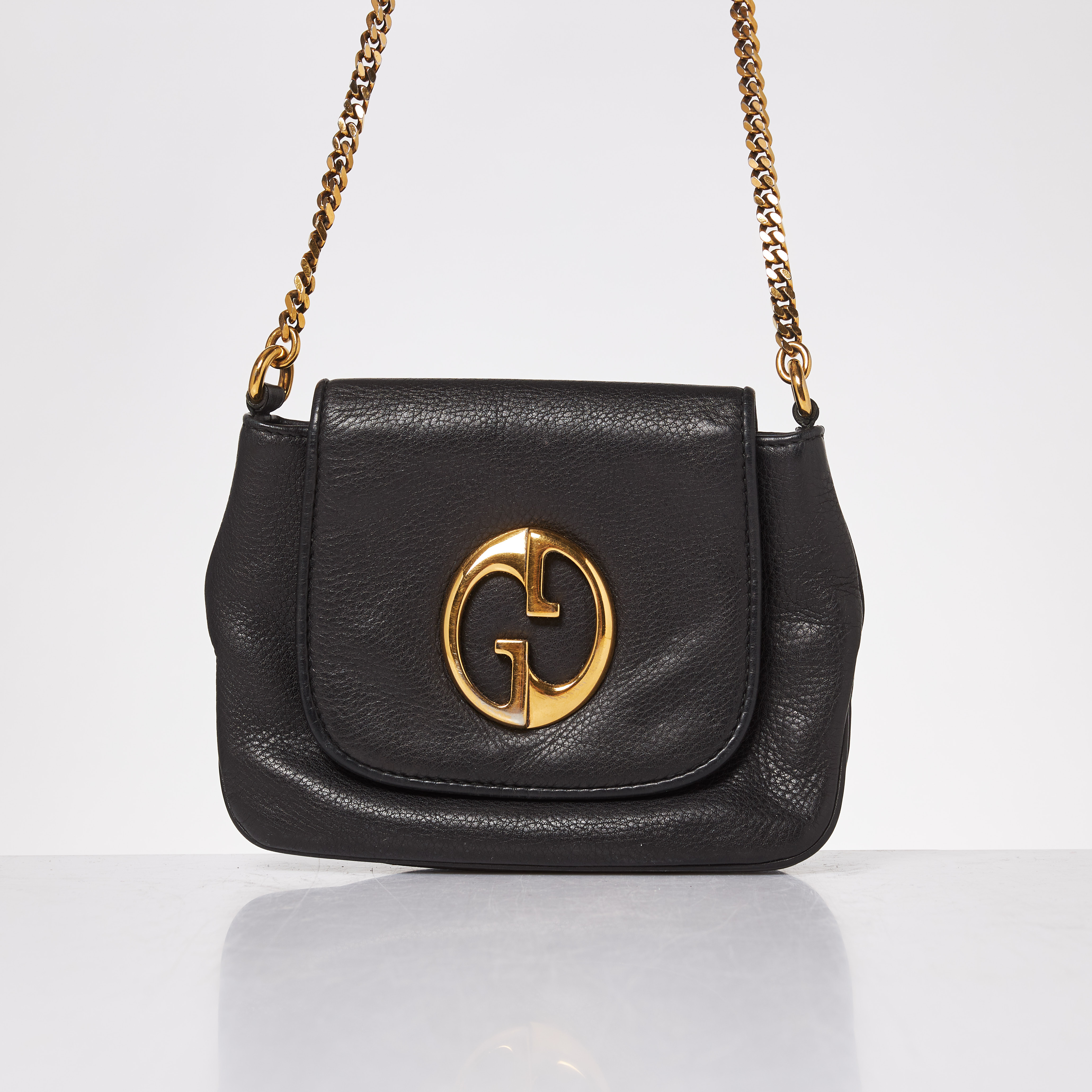 GUCCI. Small 1973 Pebbled Leather Chain Crossbody Bag Black 251821.