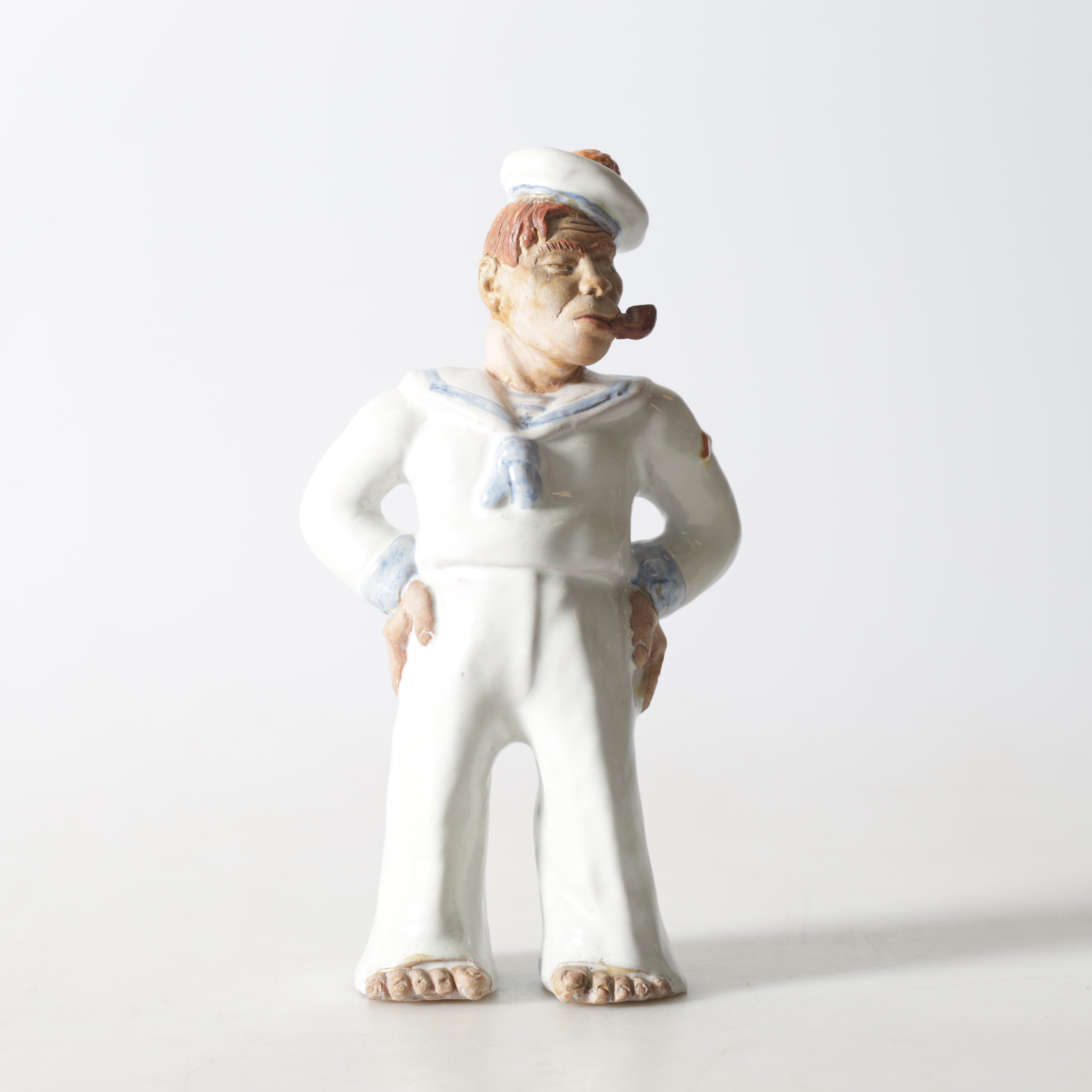 FIGURIN, delvis glaserad keramik, Ungern, 1900-tal.