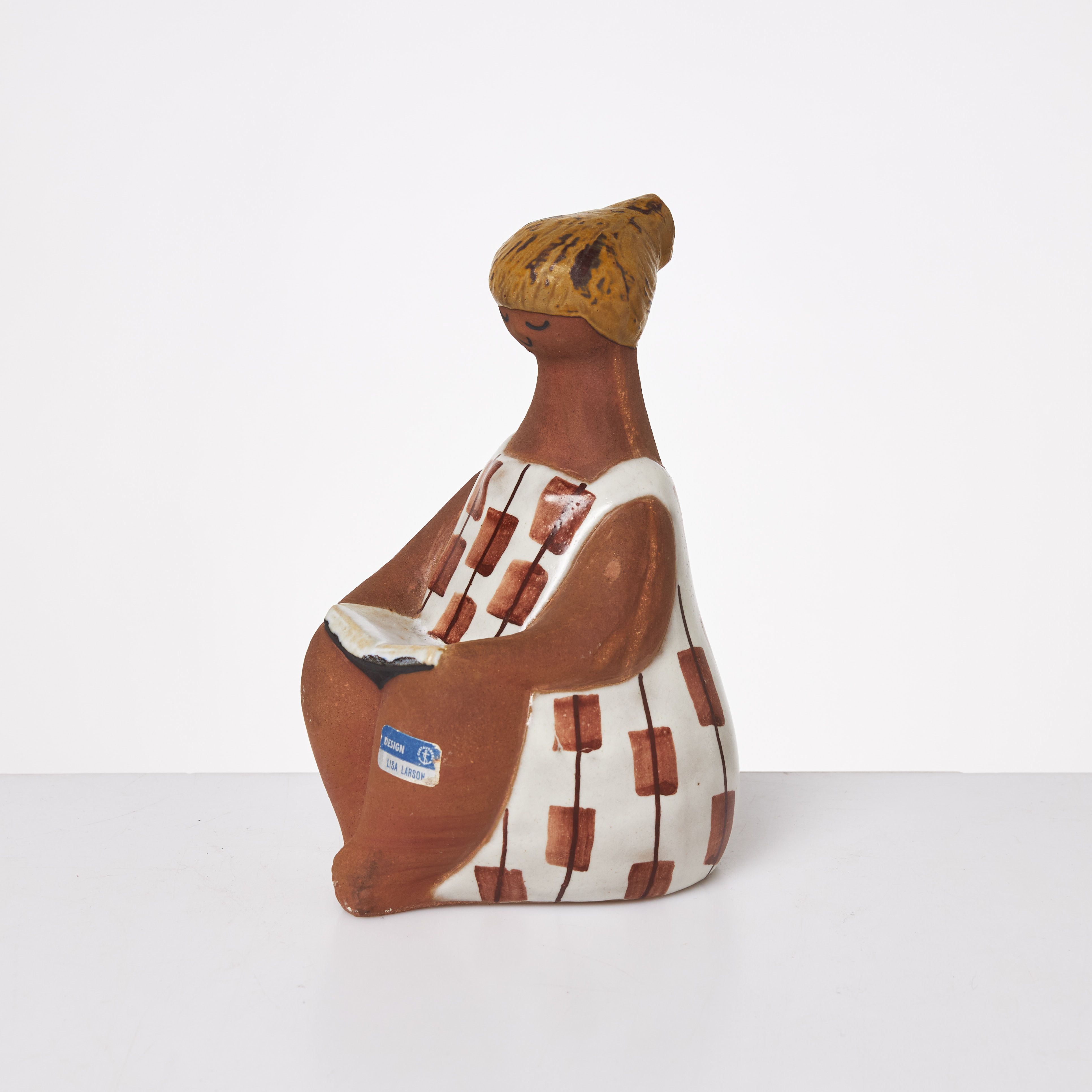LISA LARSON. "Charlotta", figurin, delvis glaserat stengods, etikettmärkt, undertill stämpelmärkt, Gustavsberg.