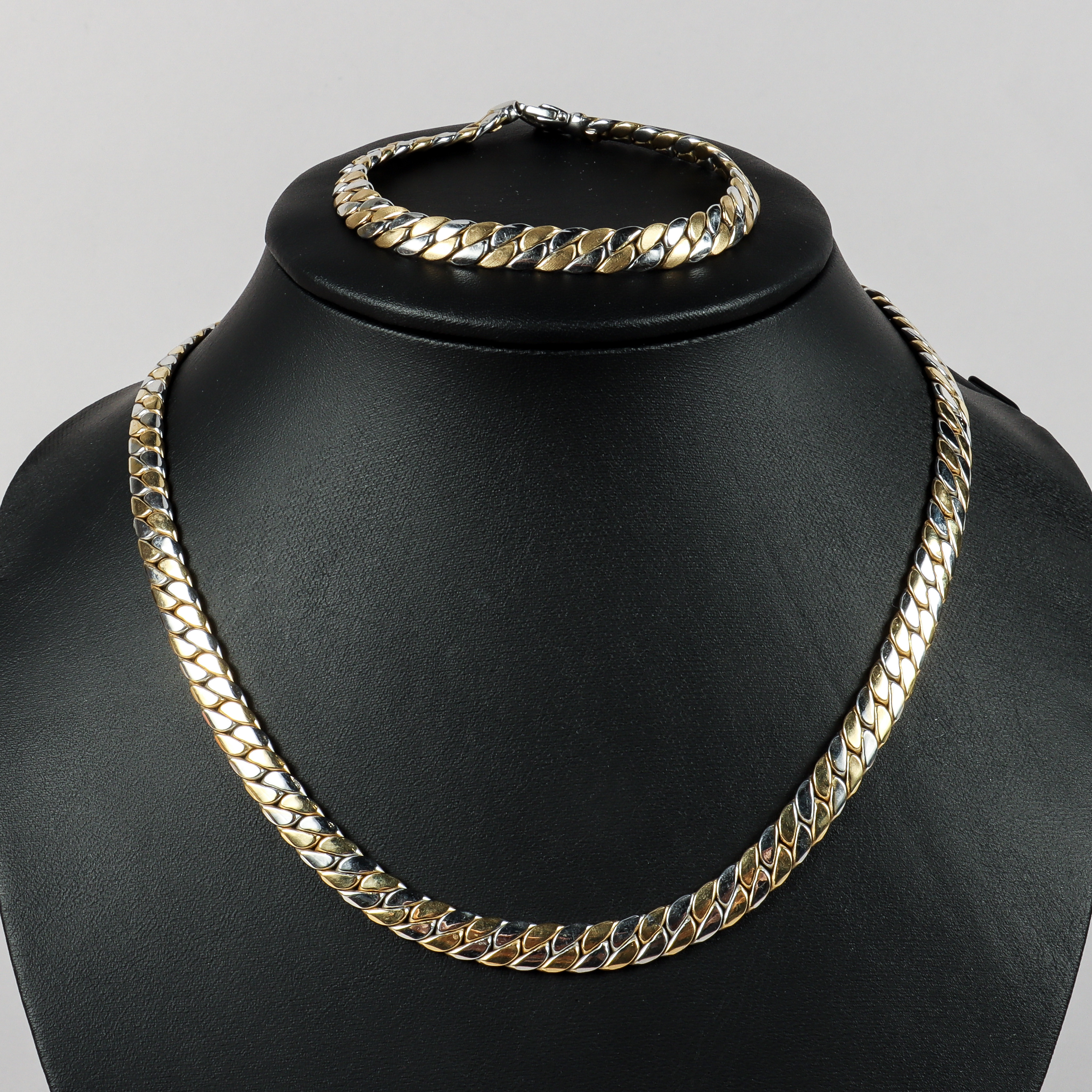 COLLIER OCH ARMBAND, "Pansarlänk", 18k tvåfärgat guld, GHA.