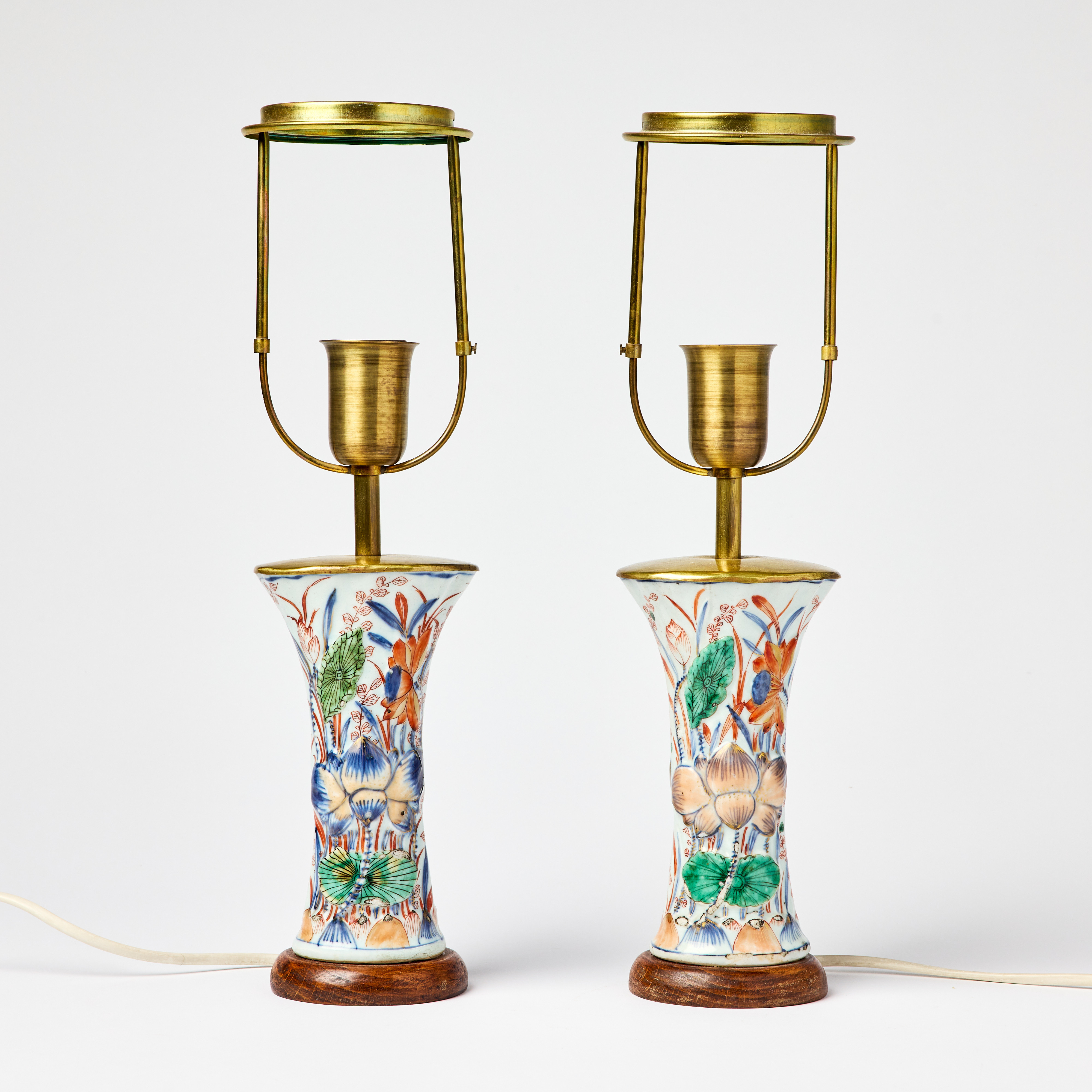 A Pair of Chinese Doucai Moulded Beaker Vases.