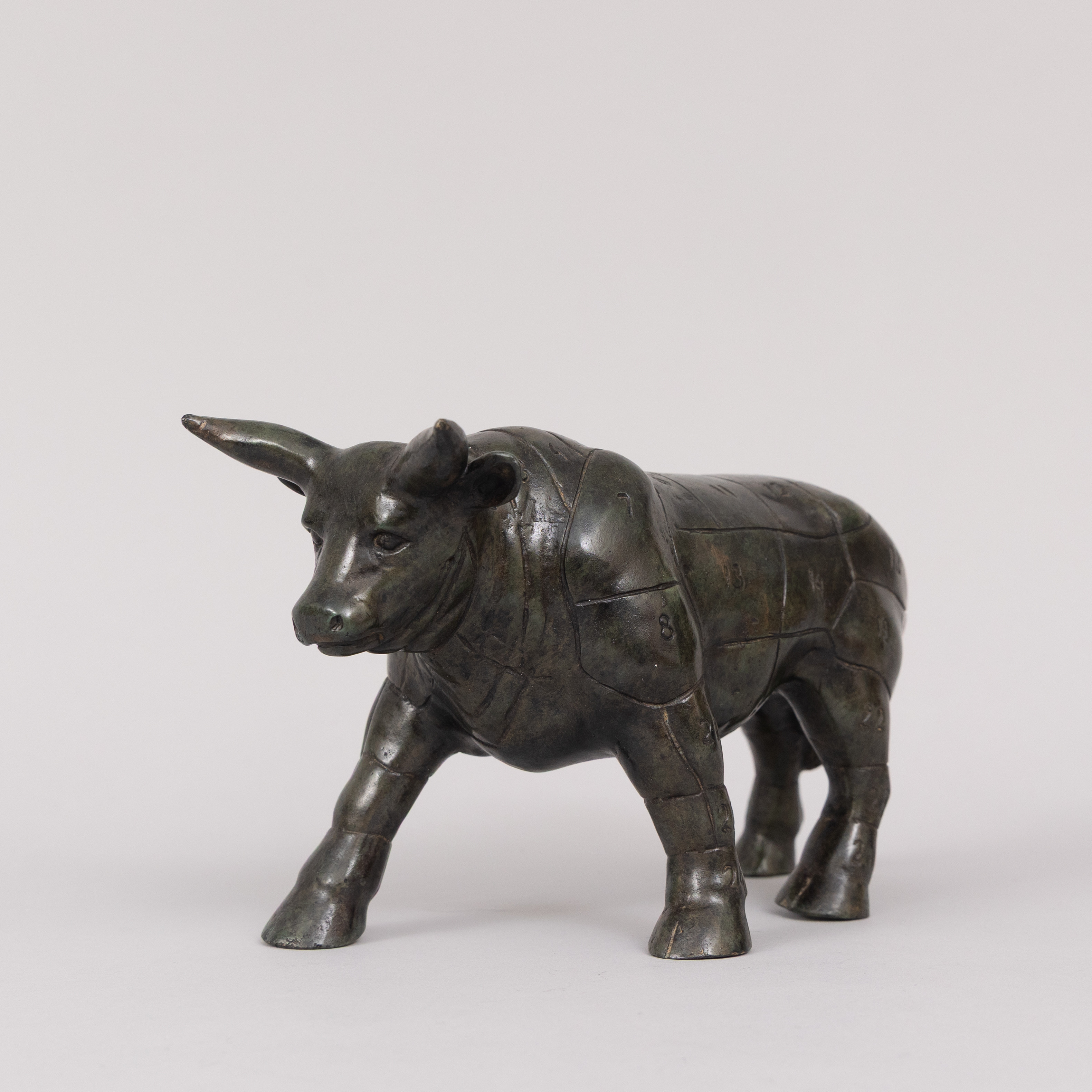 ANDREAS WARGENBRANT. Bull, brons, "Styckningsschema", handsignerad.