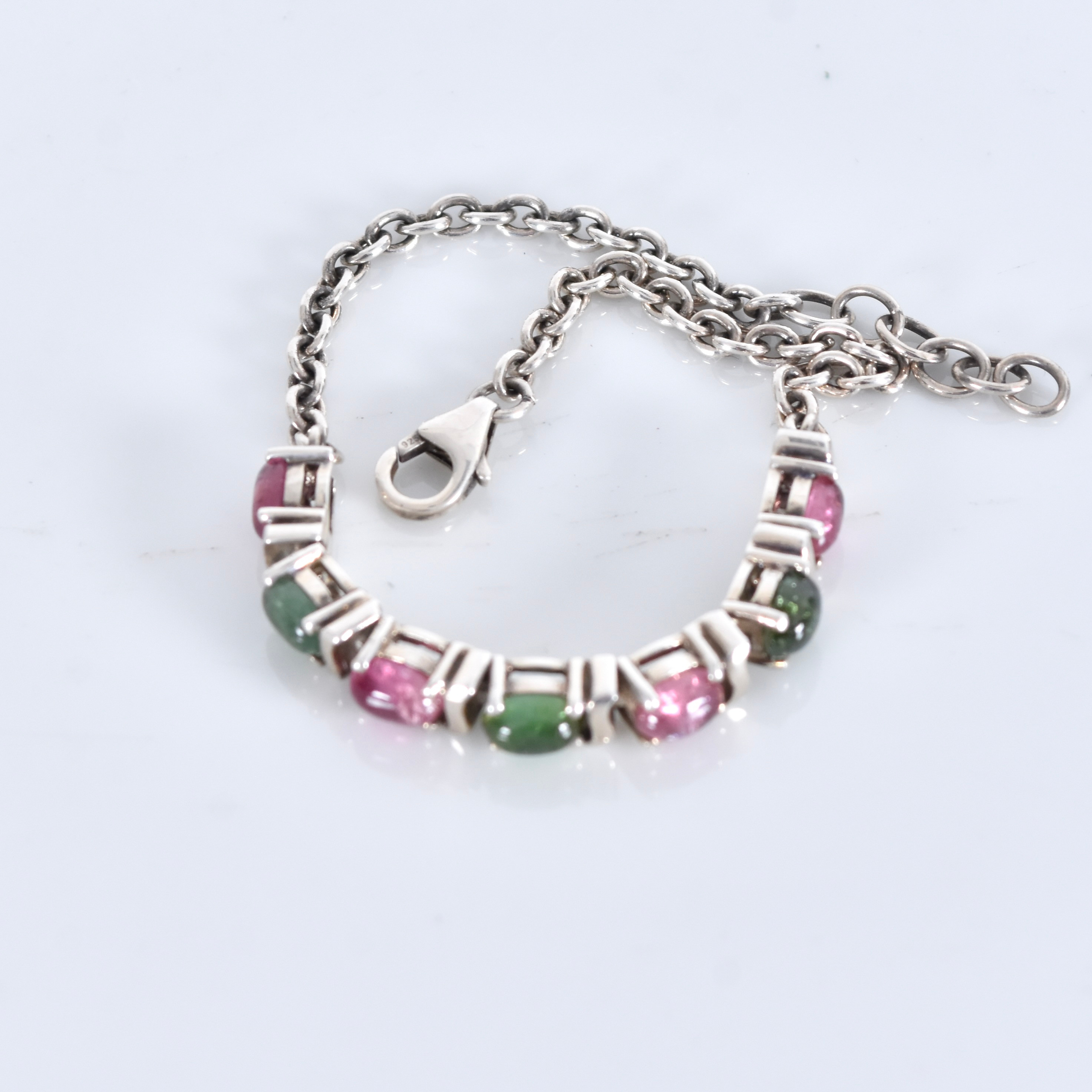 ARMLÄNK, sterlingsilver med cabochonslipade halvädelstenar.
