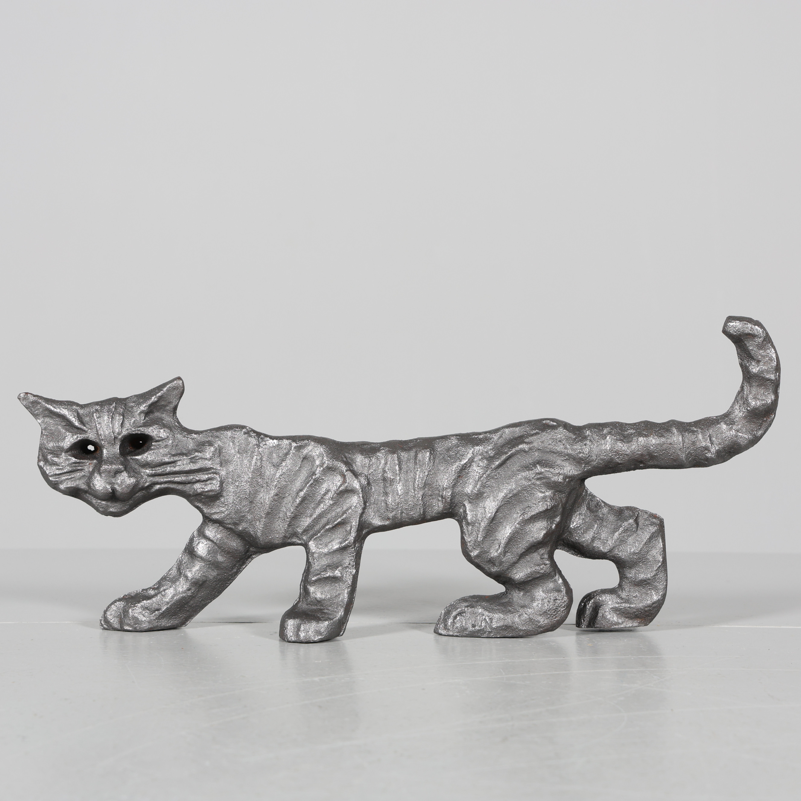 MARITA NORIN. ELDKATT, gjutjärn, monogramsignerad M.N.
