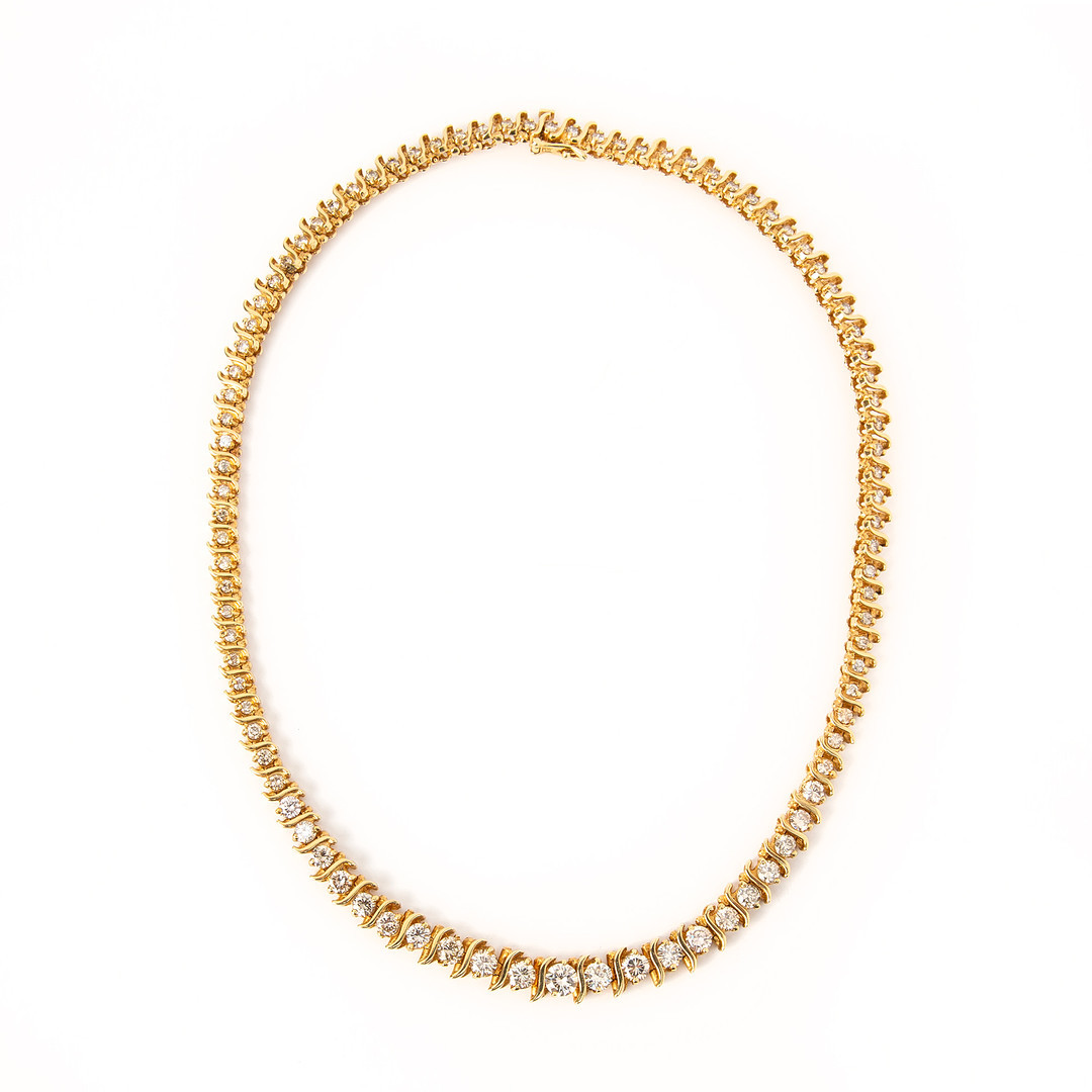COLLIER, 14K guld med 90 st briljantslipade diamanter, totalt ca 6.74 ct.