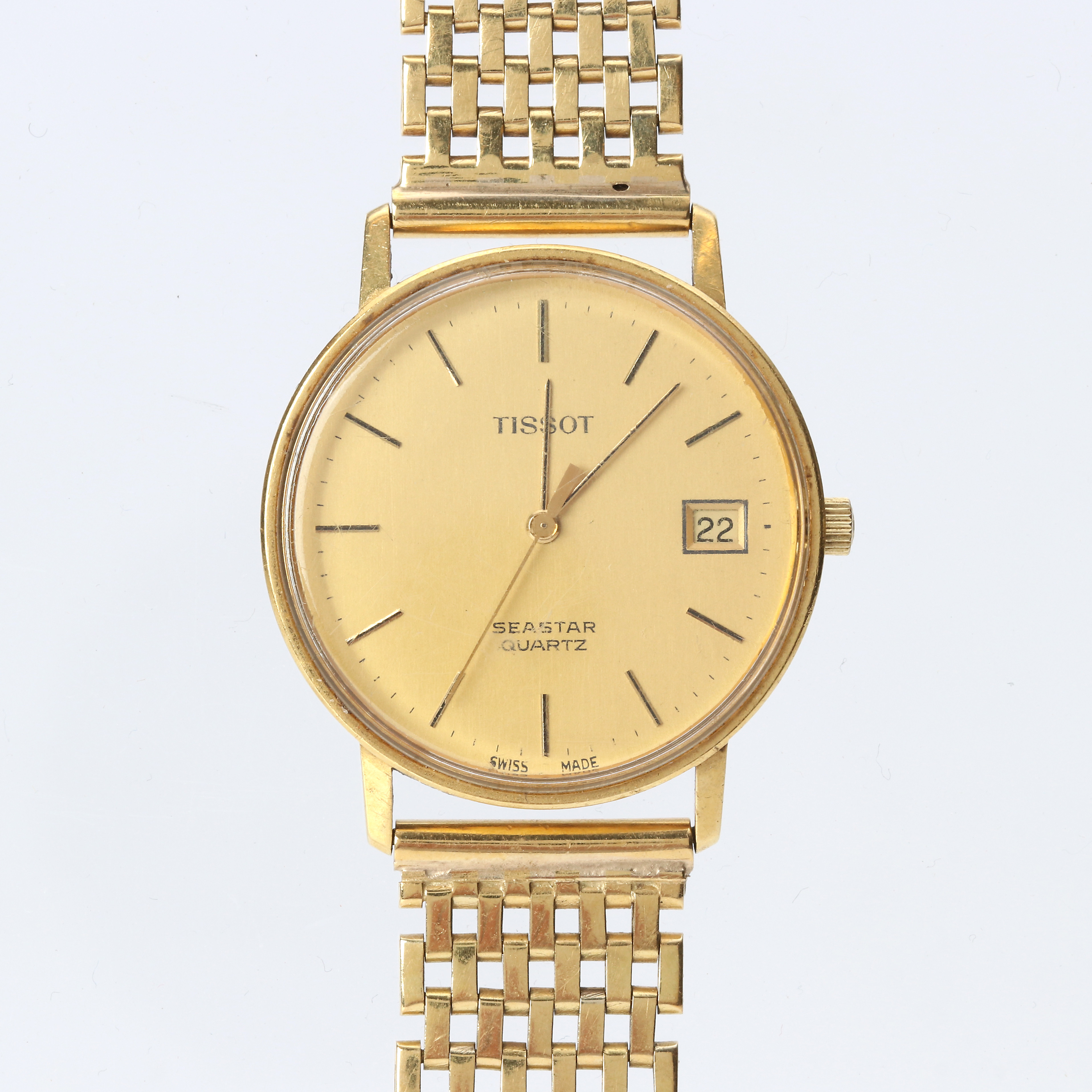 TISSOT SEASTAR, ARMBANDSUR. 18k guld i boett och länk, quartz, totalvikt ca 59,2 gram.