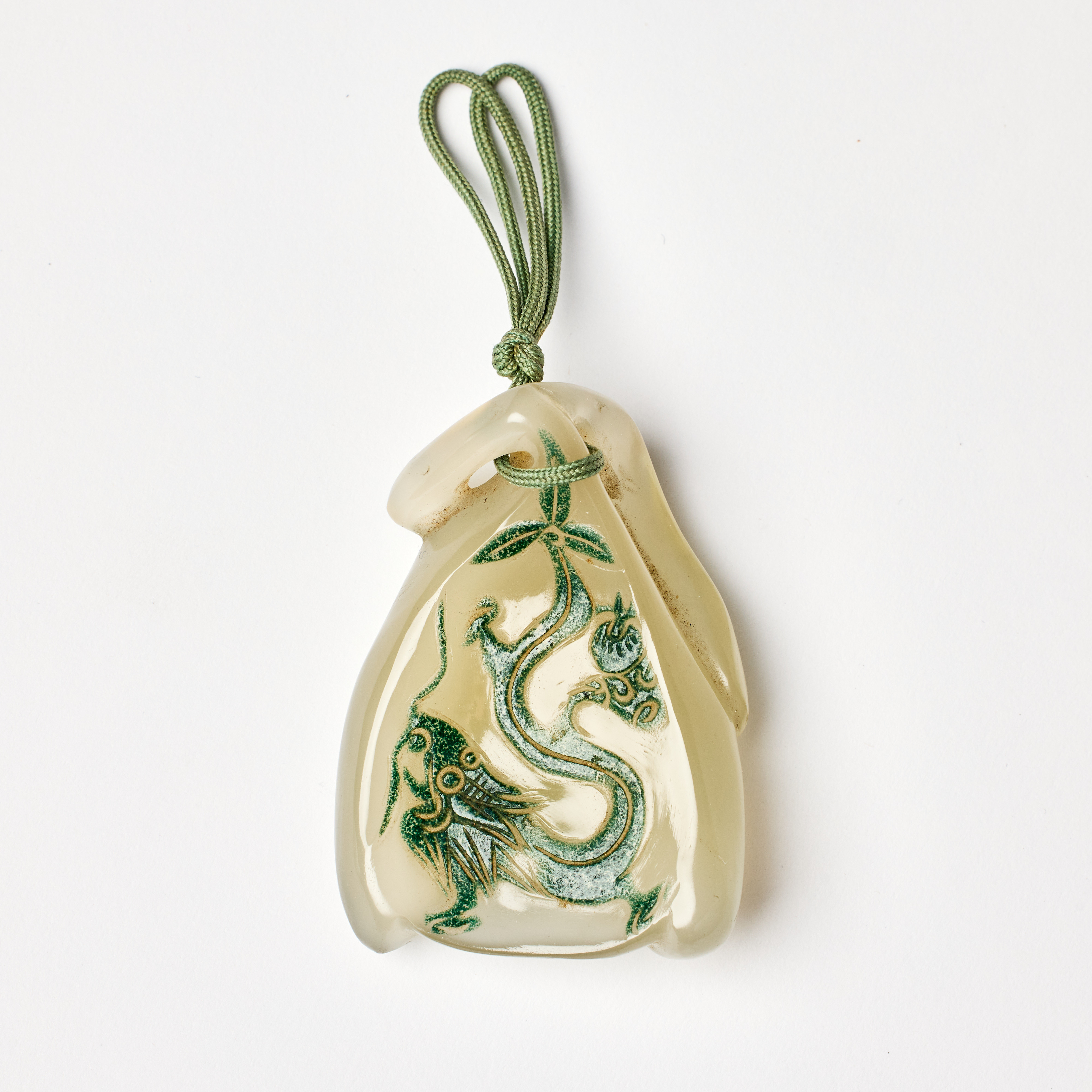 A Pale Green Bowenite Pendant.