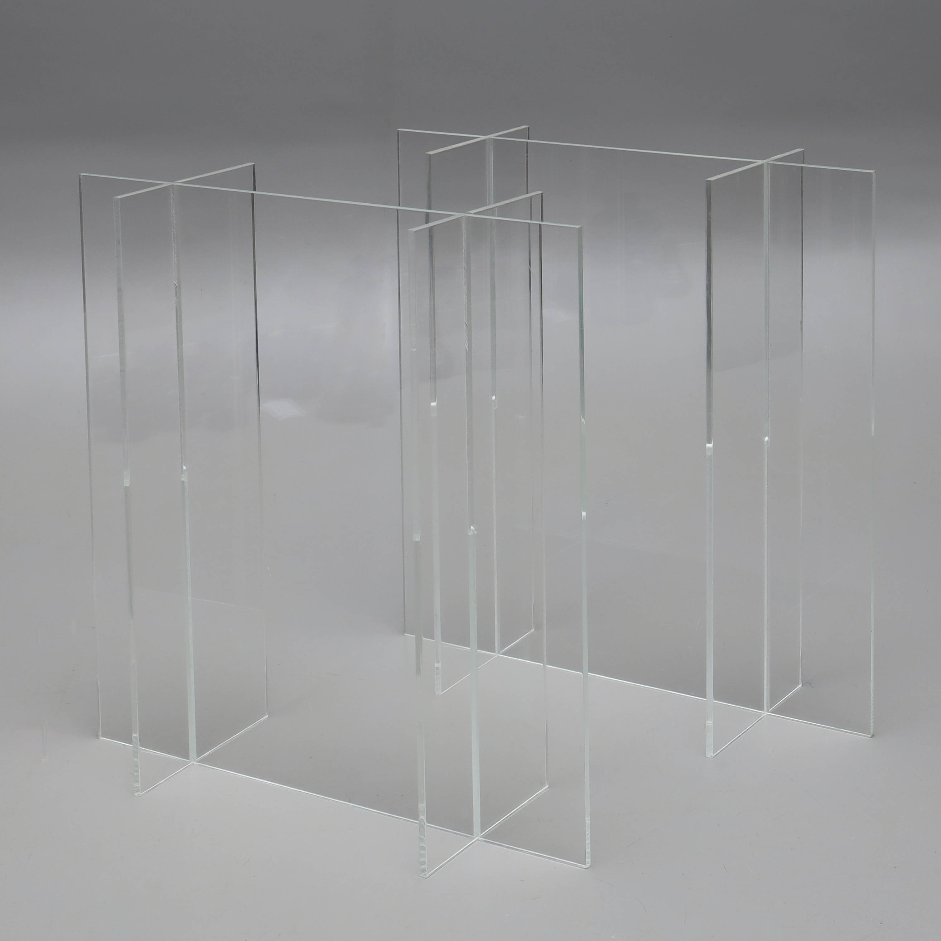 BORDSUNDERREDE, ett par, plexiglas, 1900-tal.