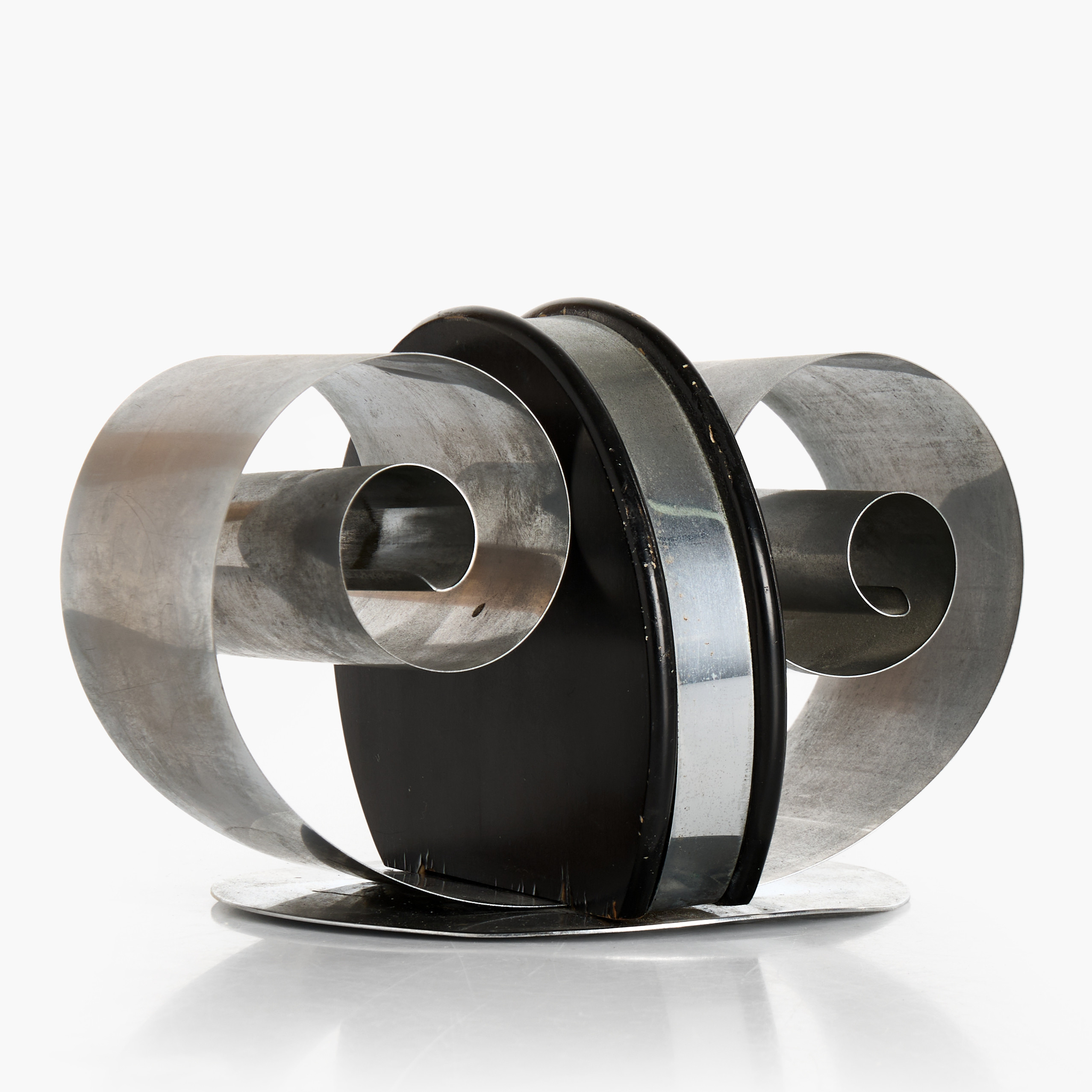BOKSTÖD, svartlackerat trä och metall, 1930-tal. Art Deco.