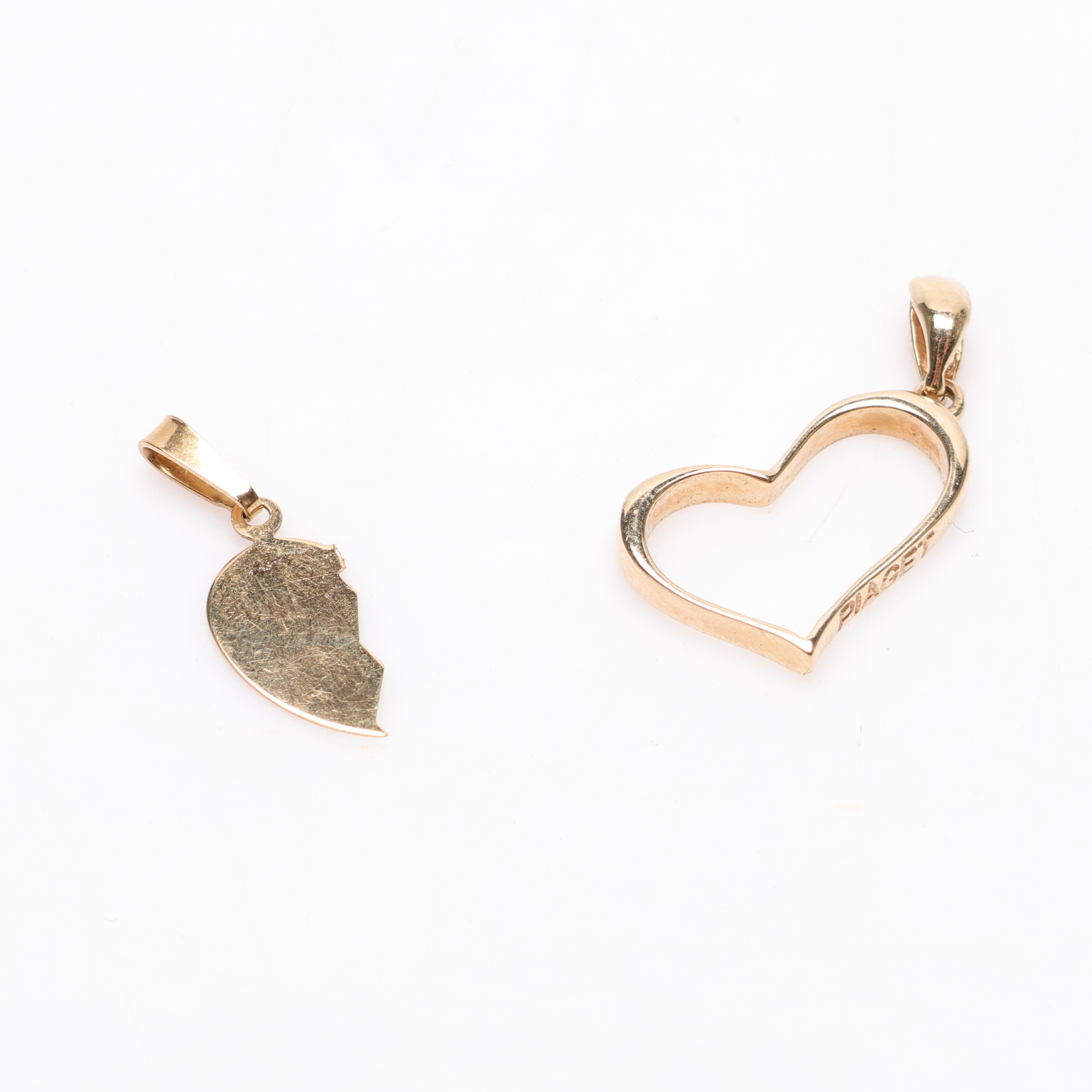 HÄNGEN, två stycken, Guld 18K, vikt cirka 2,2 gram.