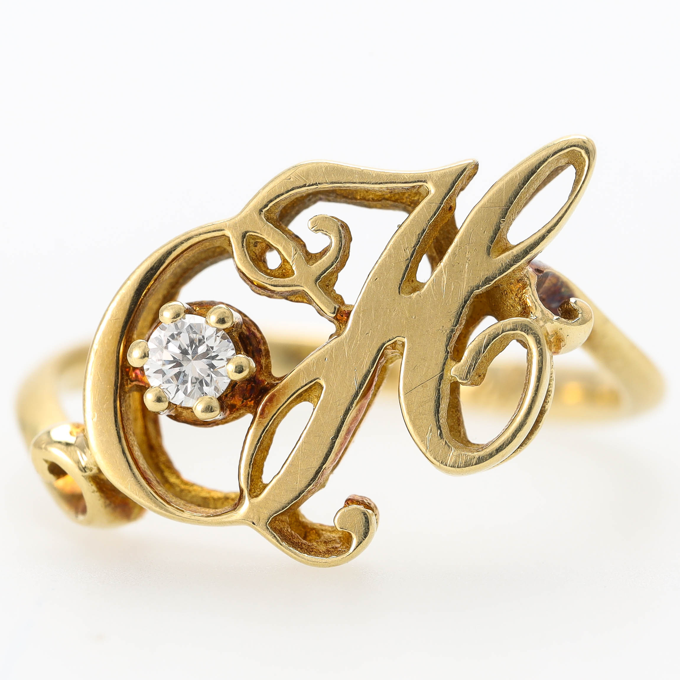 RING, 14 k guld med briljantslipad diamant, 0,08ct, monogram CH.