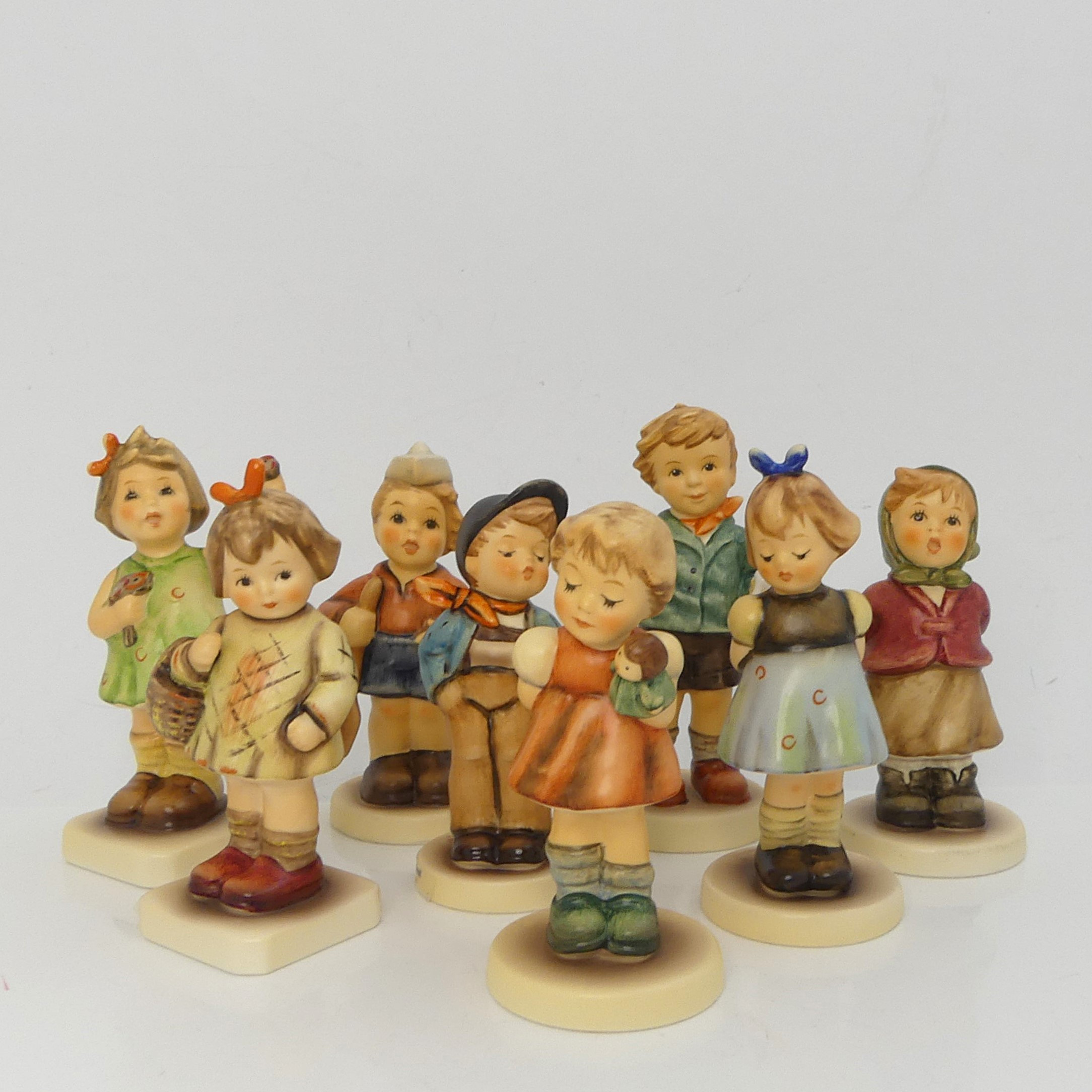 FIGURINER, åtta delar, M.I. Hummel Club Goebel Tyskland.