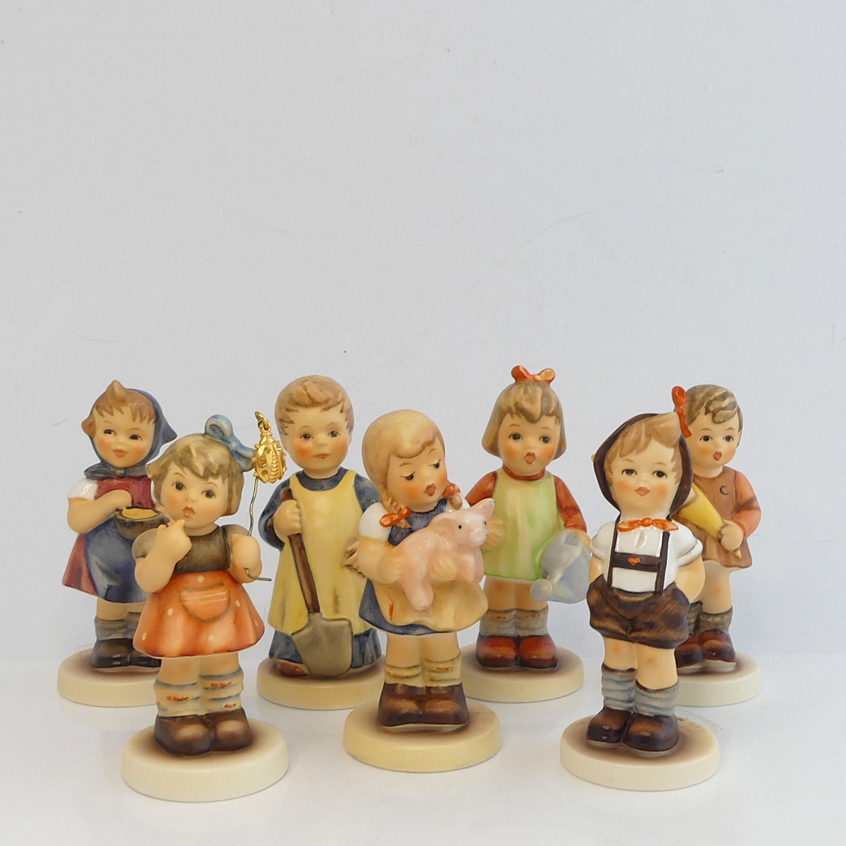 FIGURINER, sju delar, M.I. Hummel Club Goebel Tyskland.