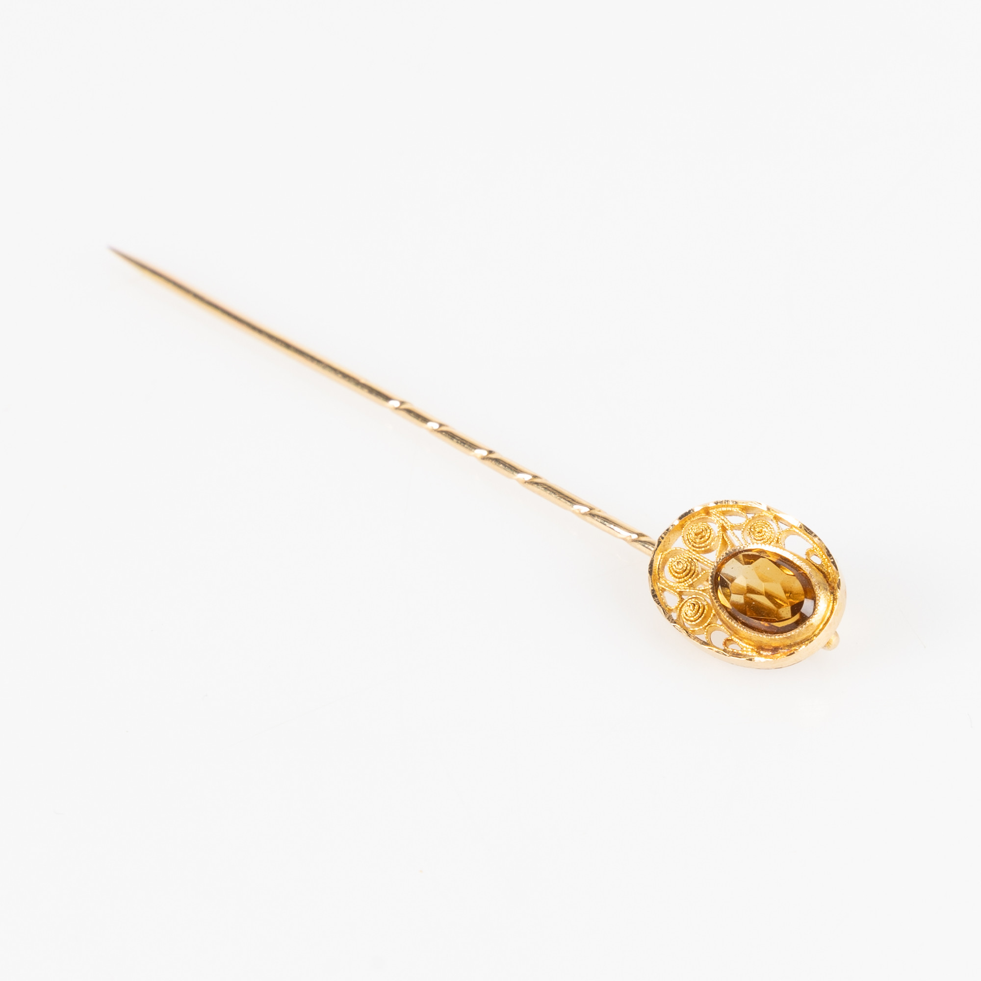 BROSCHNÅL, 18K guld med fasettslipad citrin, Gustav Dahlgren & Co, Malmö, 1928.
