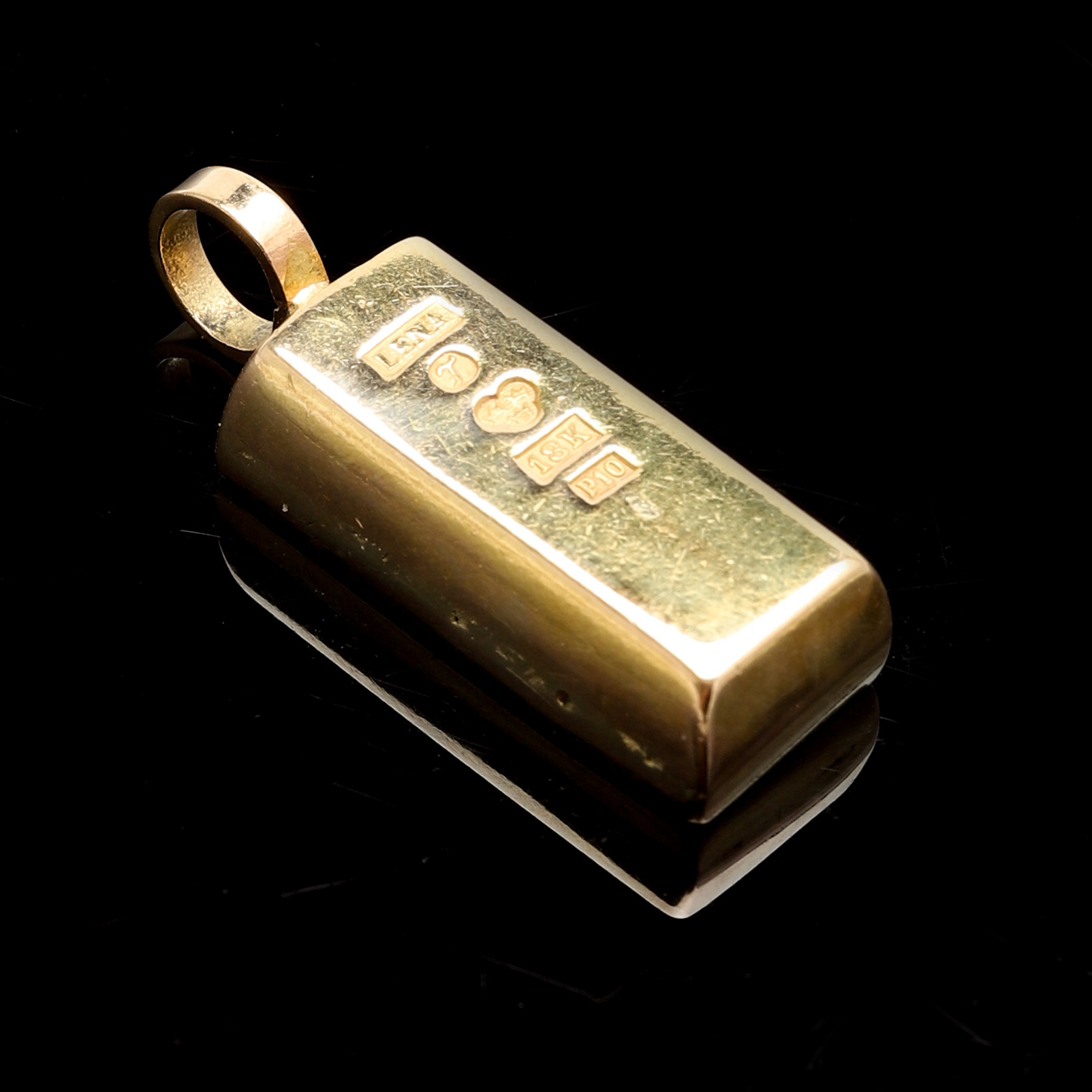 HÄNGSMYCKE, 18K guld. Form av guldtacka. Lenas Guld o Silver, Trelleborg, 1989. Vikt ca 19,7 gram.