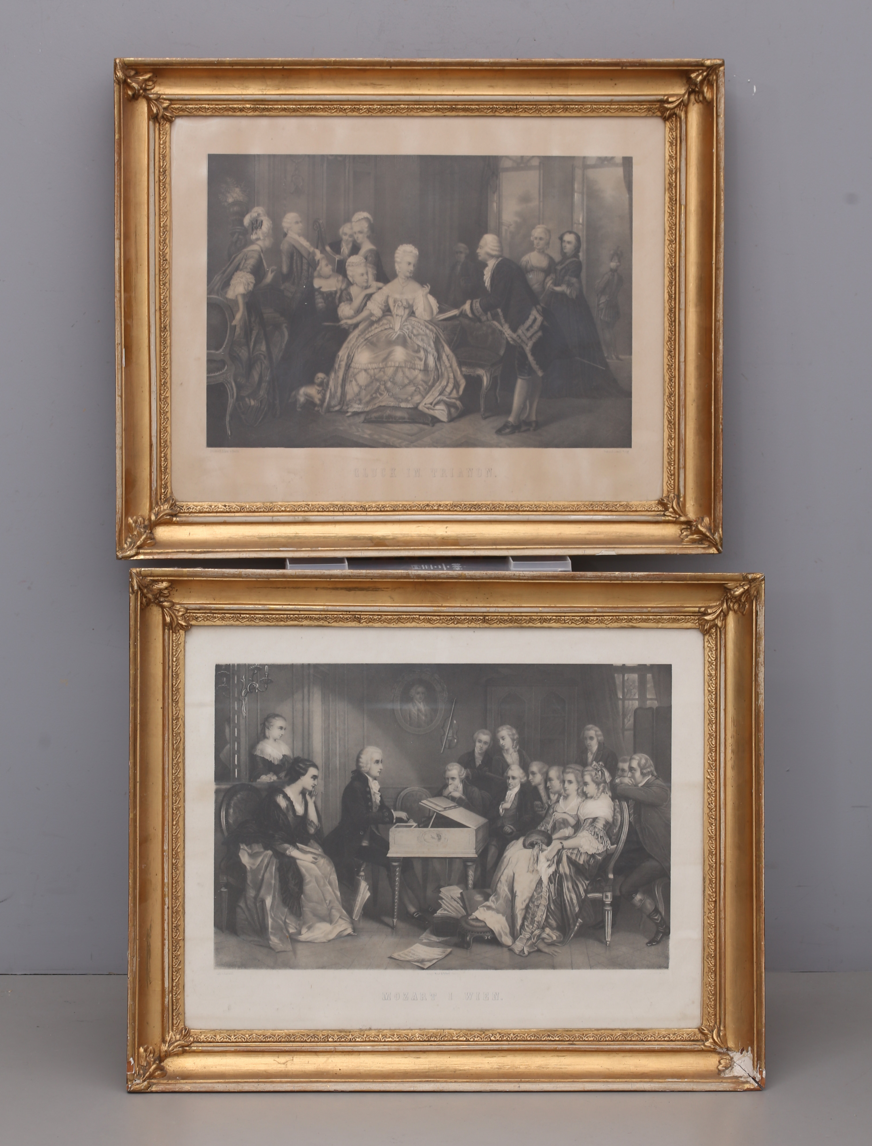 TRYCK, 2 st, i bronserade ramar, "Gluck in Trianon" samt "Mozart i Wien", 1900-tal.