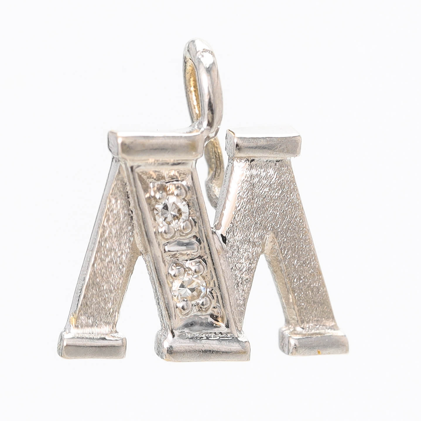 HÄNGE, 18 k vitguld, delvis satinerat, åttkantslipade diamanter, 0,02ct enligt gravyr.