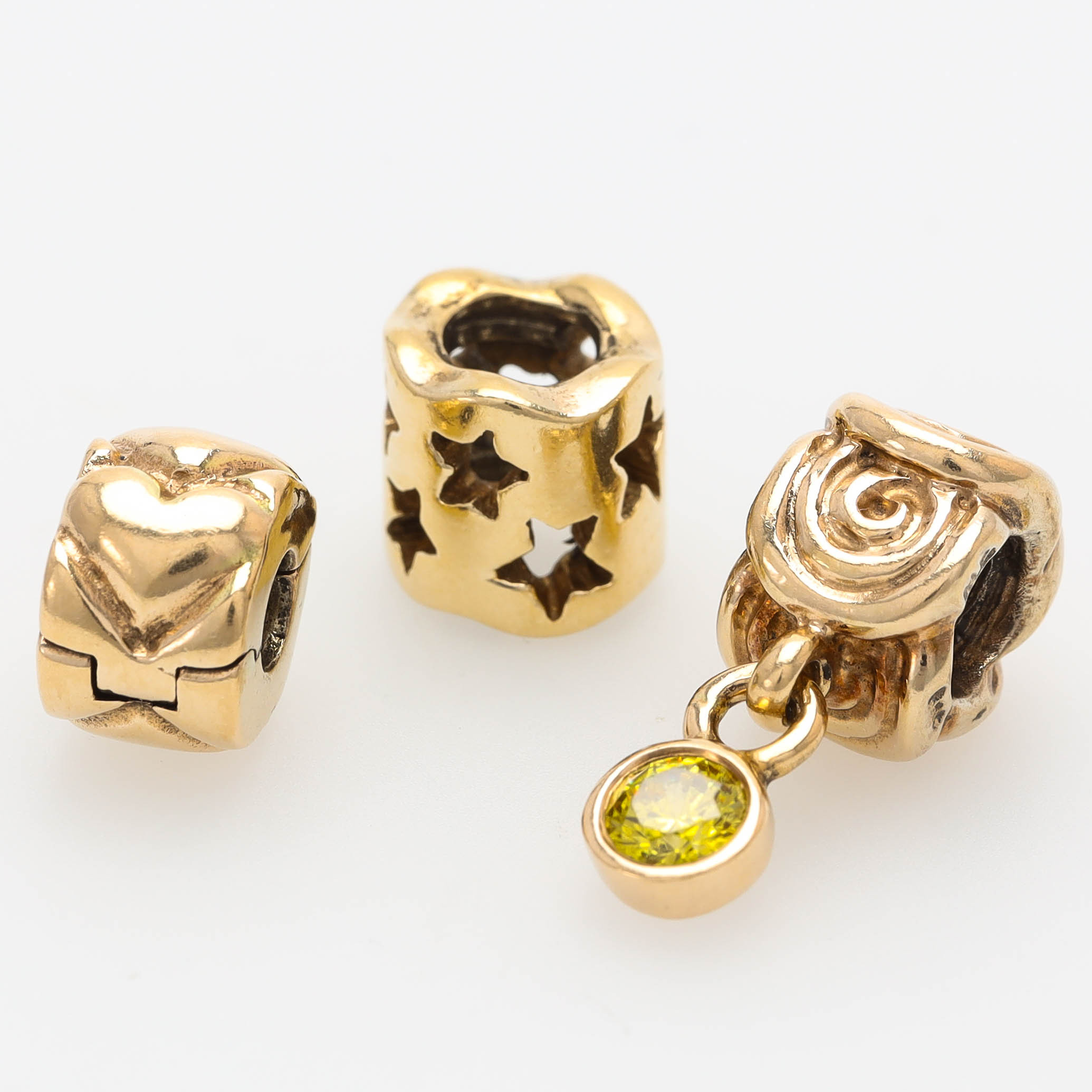 PANDORA, 3 st berlocker, 14 k guld, vikt 9,8 gram.