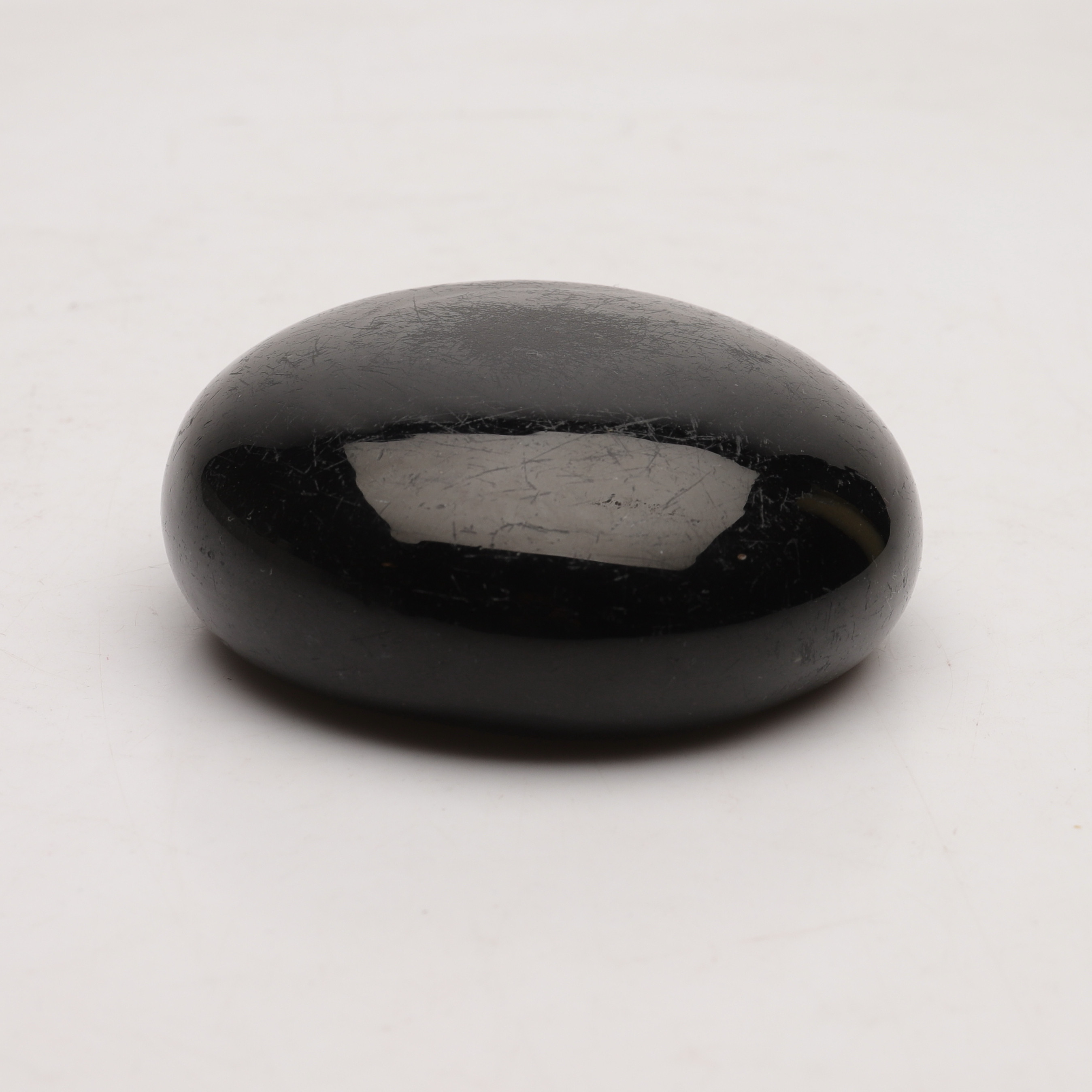 GLÄTTSTEN, så kallad gniestein, glas, 17/1800-tal.