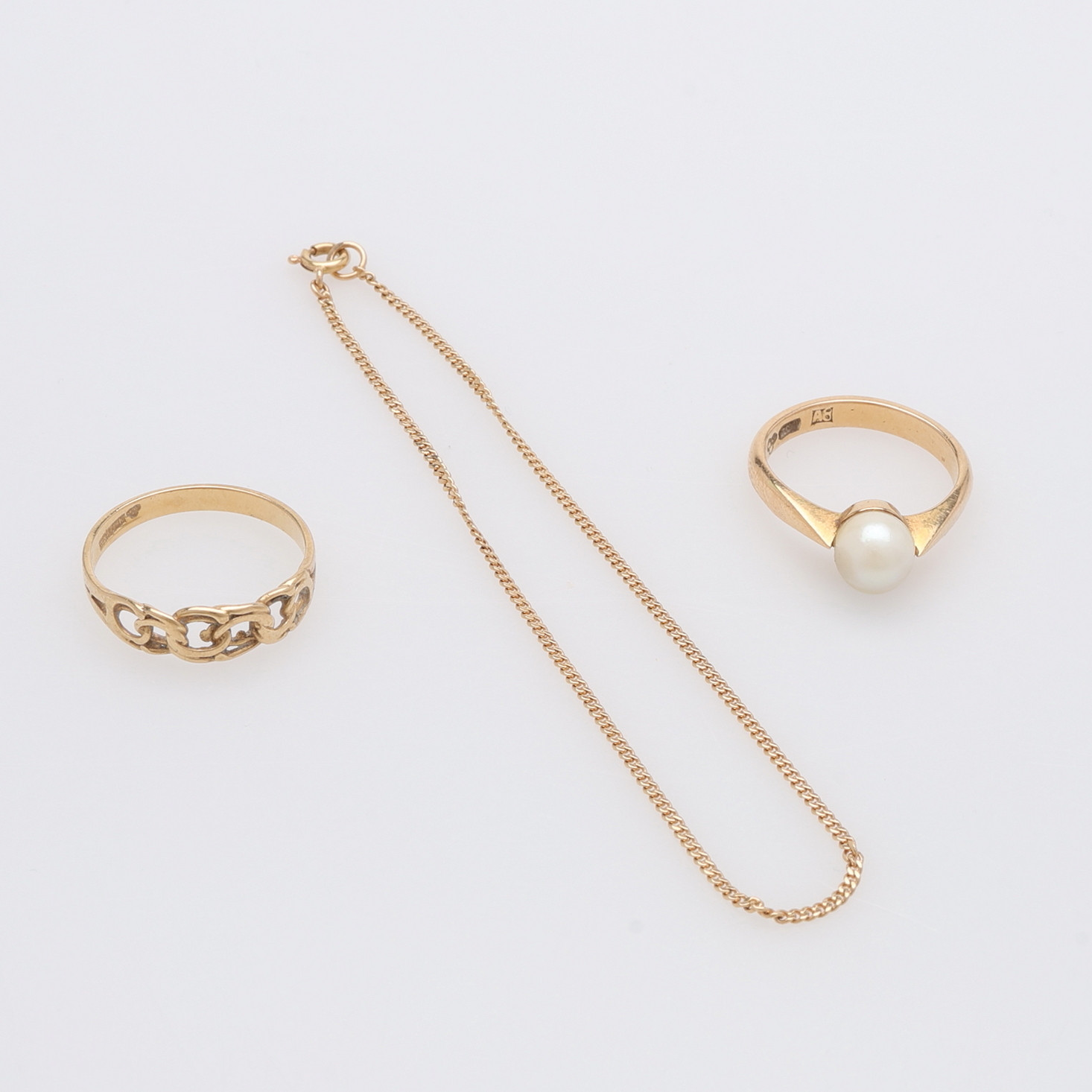 2 RINGAR & 1 ARMBAND, 18K GULD, TOTALVIKT CA 7,6 G.