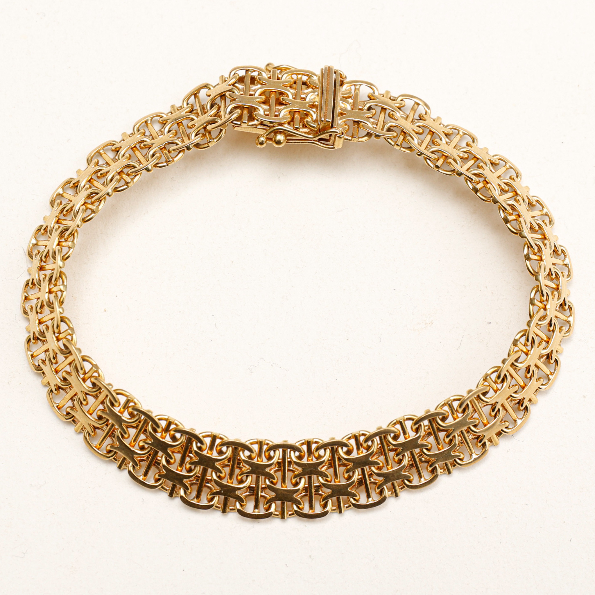 ARMBAND, 18 karat guld, x-länk, vikt ca 19,5 gram.