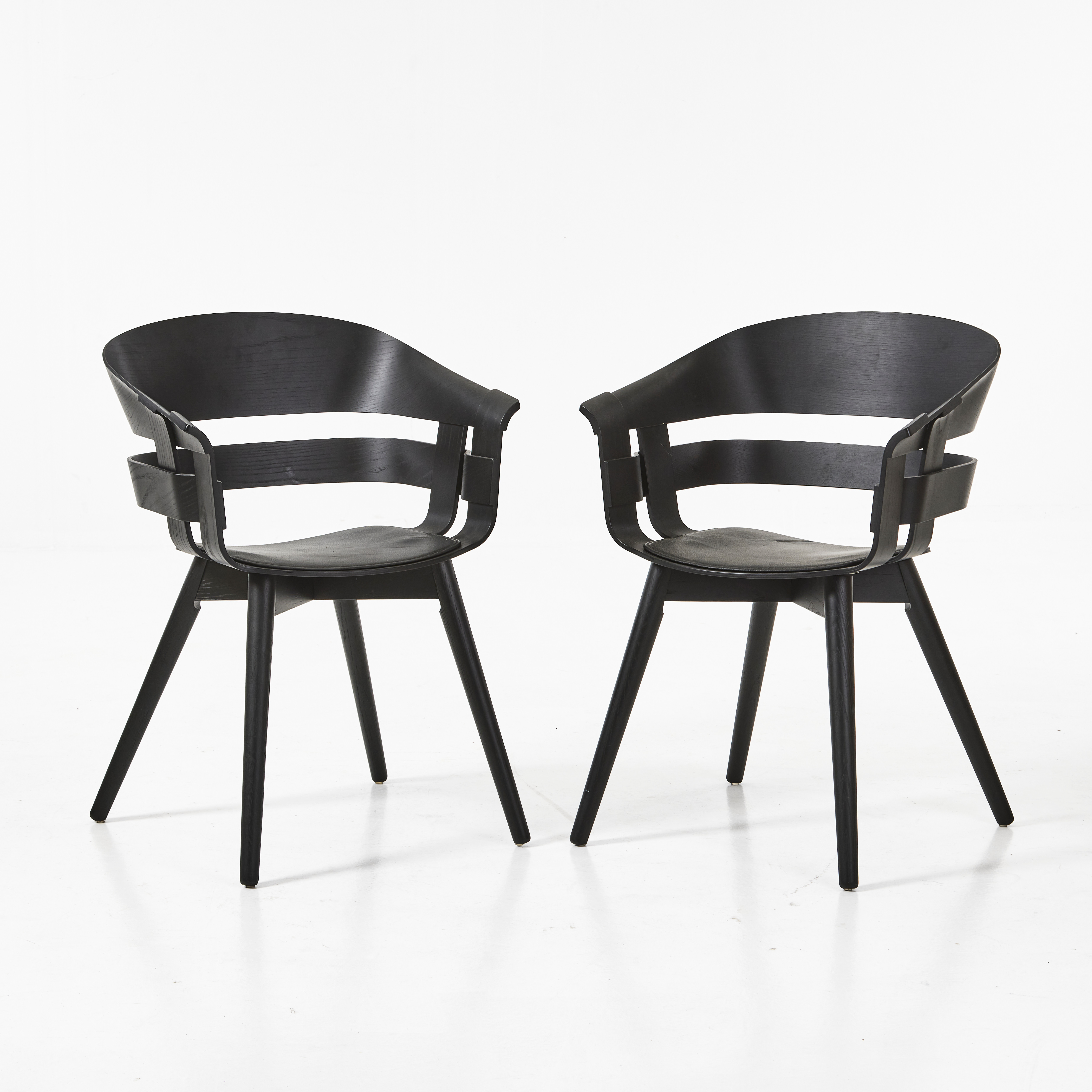 KARL MALMVALL & JESPER STÅHL. KARL MALMVALL & JESPER STÅHL. "Wick chair" 2 st för Design House Stockholm, med sittdynor.