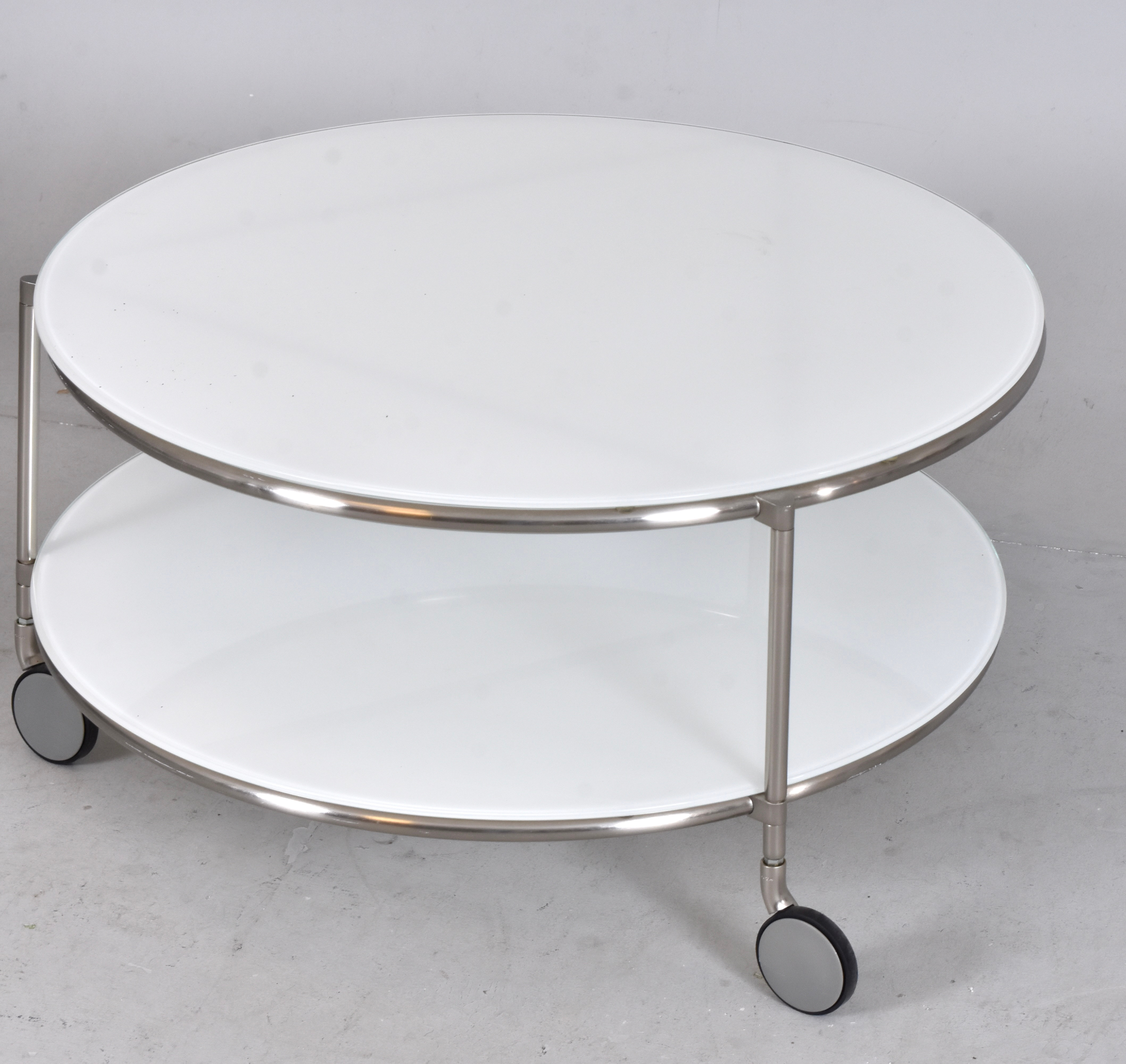 EHLEN JOHANSSON. Soffbord, "Strind", IKEA, glas och kromad metall, på hjul.