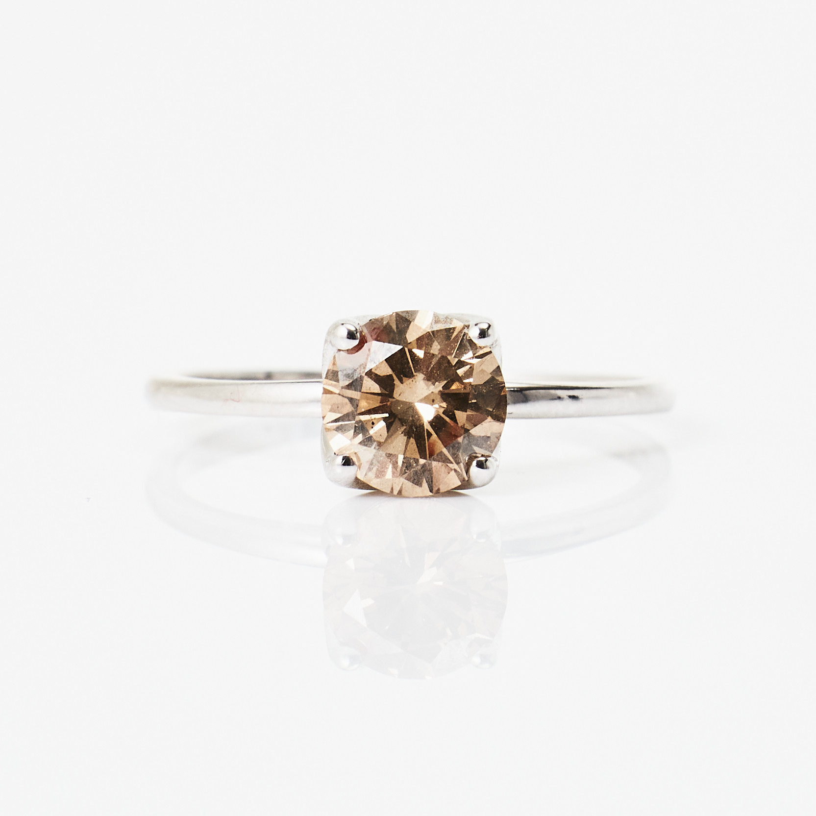 RING, 14 k vitguld, briljant 1,06 ct, Fancy Orangy Brown, SI2, enligt medföljande certifikat.