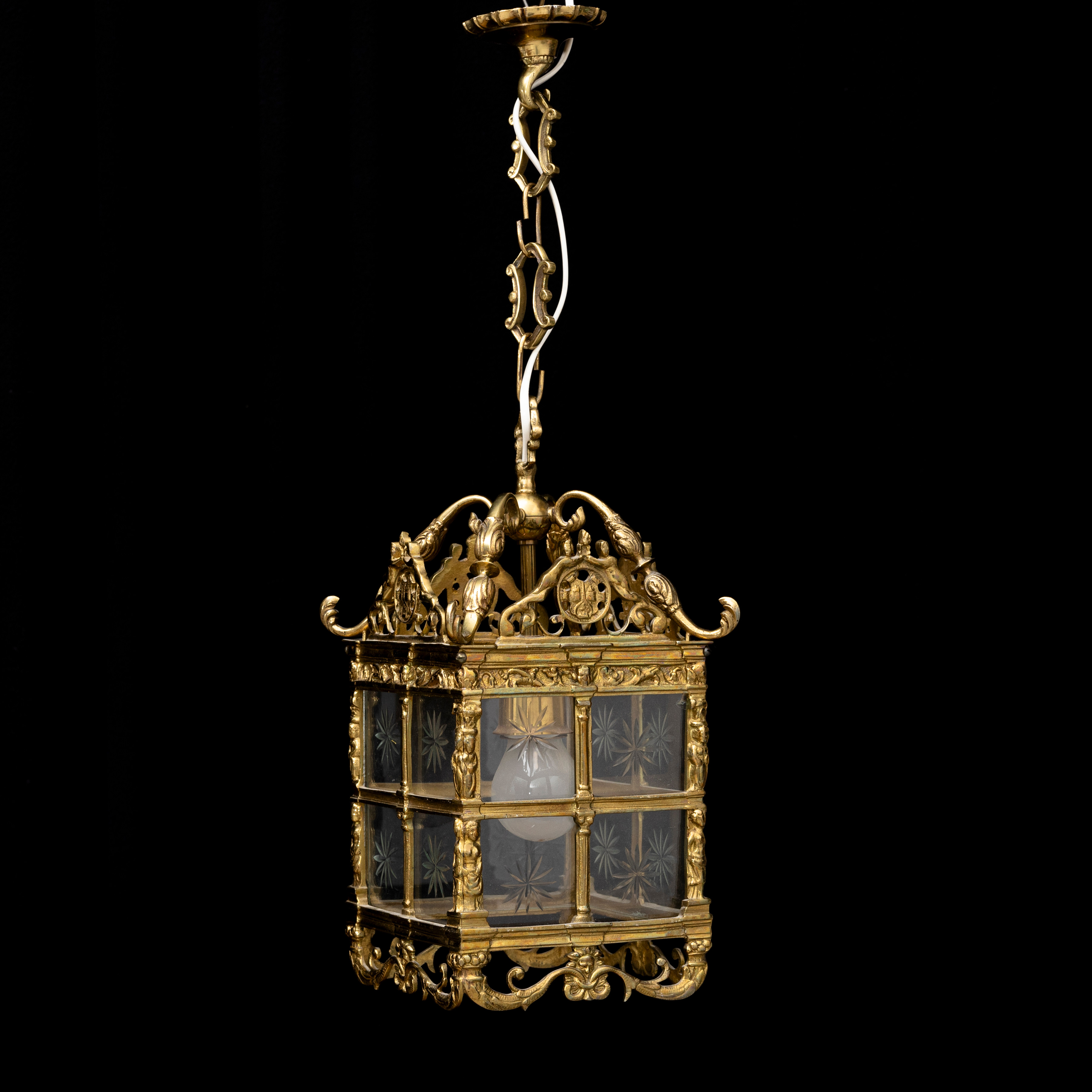 TAKLYKTA, mässing och glas, 1900-tal. Höjd ca 36 cm.