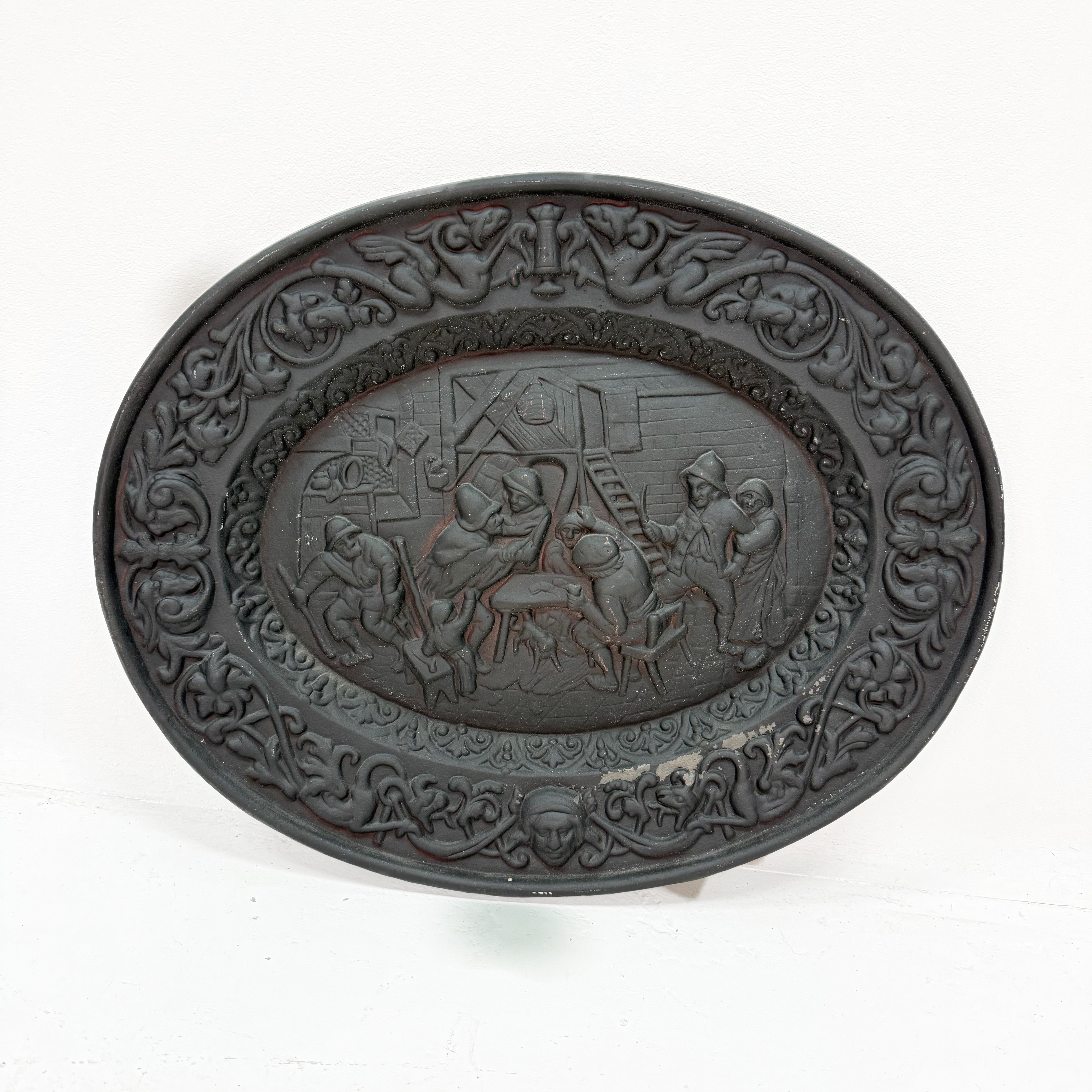 VÄGGSKÖLD, gjutjärn, Brandstorp, krogslagsmål i relief.
