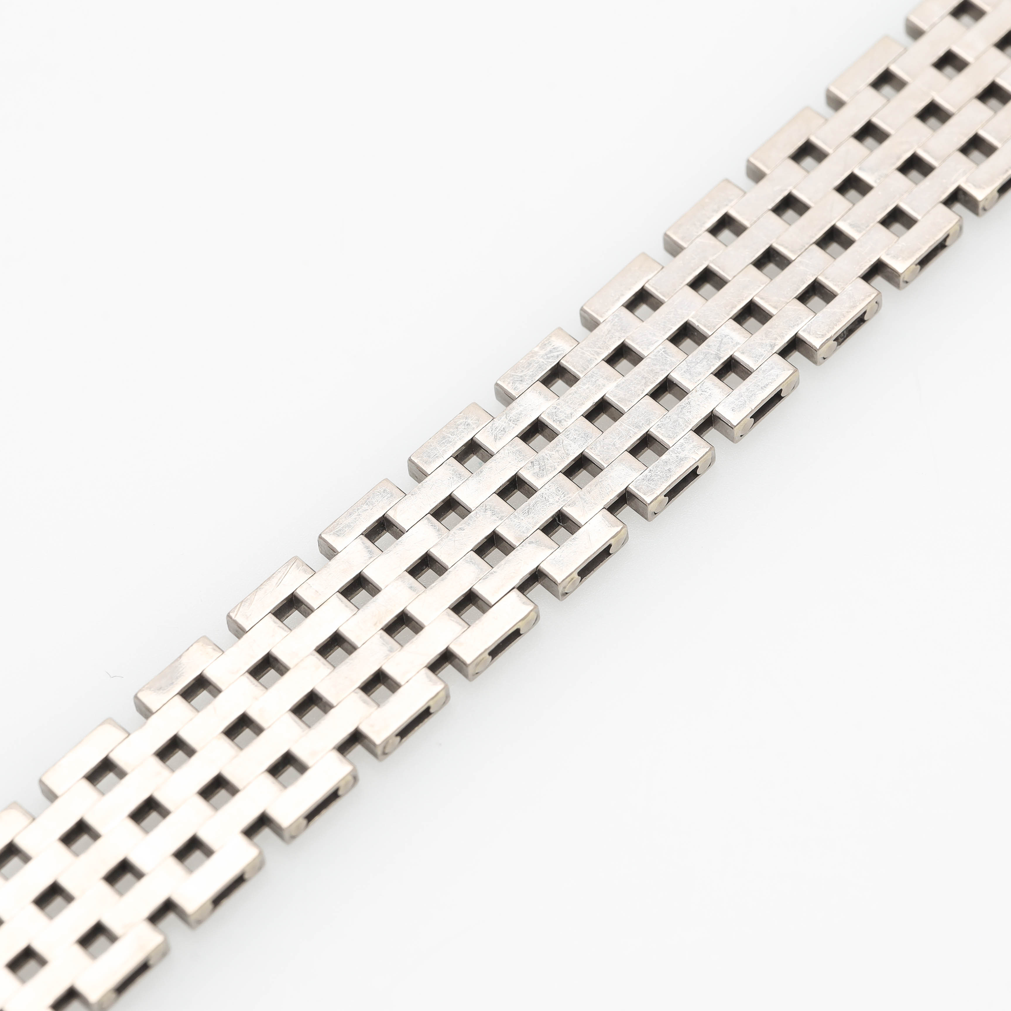 ARMBAND, 18 k vitguld, korridorslänk, T. Clareus, Stockholm 1989.