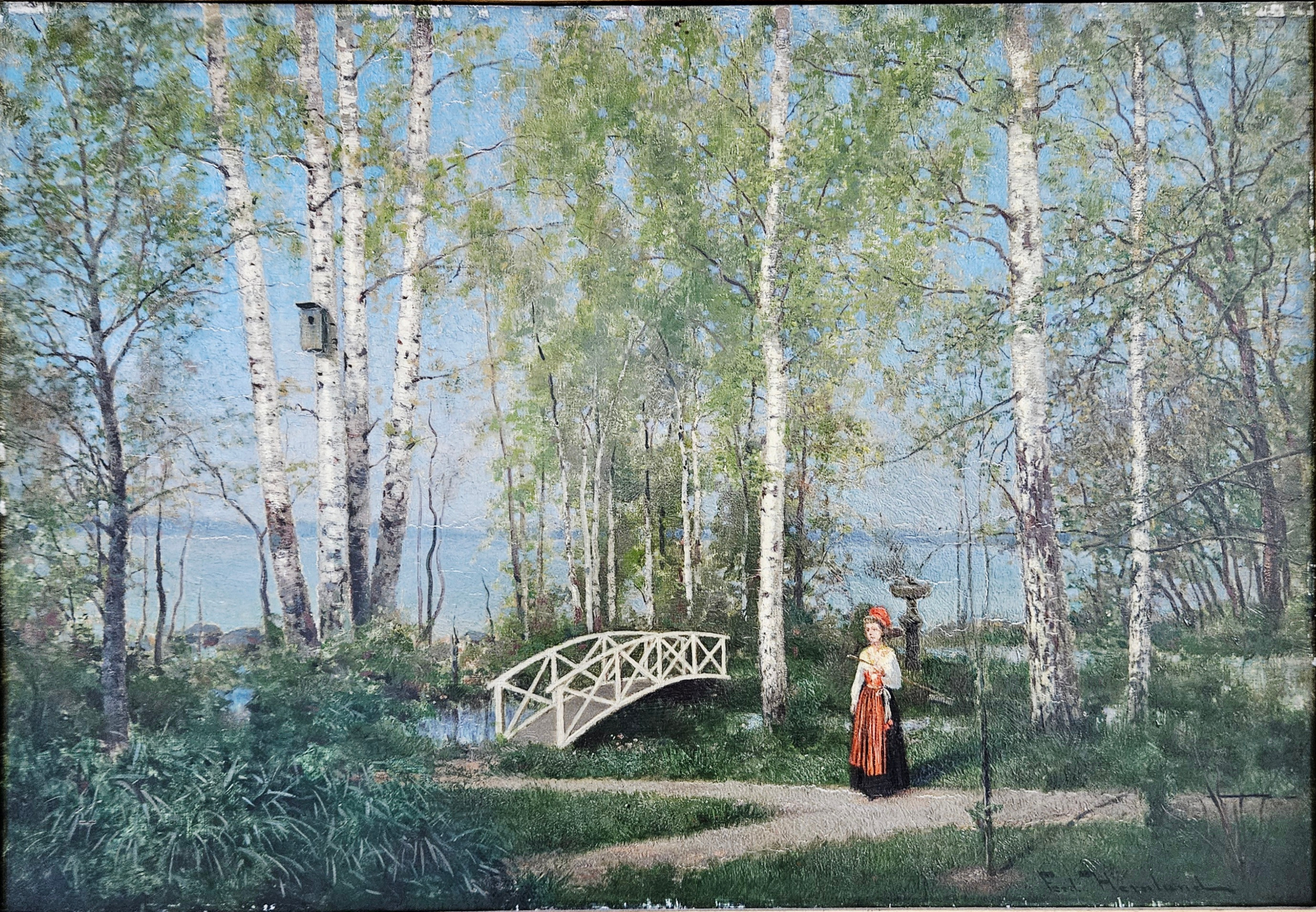 FERDINAND HERNLUND. Landskap med kvinna, bro och fågelholk. Olja på duk, signerad Ferd. Hernlund.