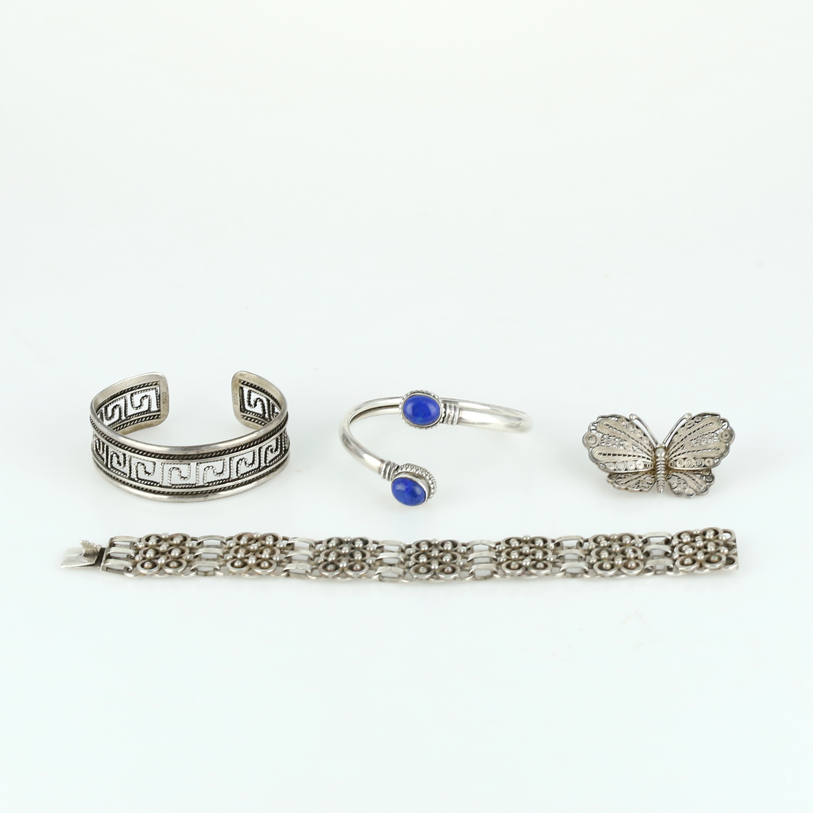 BROSCH och ARMBAND, silver, filigran, lapis lazuli.