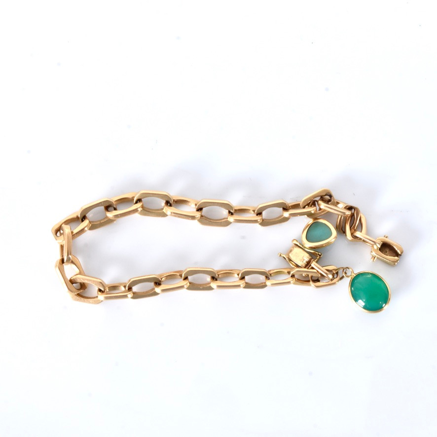 ARMBAND MED BERLOCKER, 18 karat rödguld, John Hoffner Uppsala 1947.
