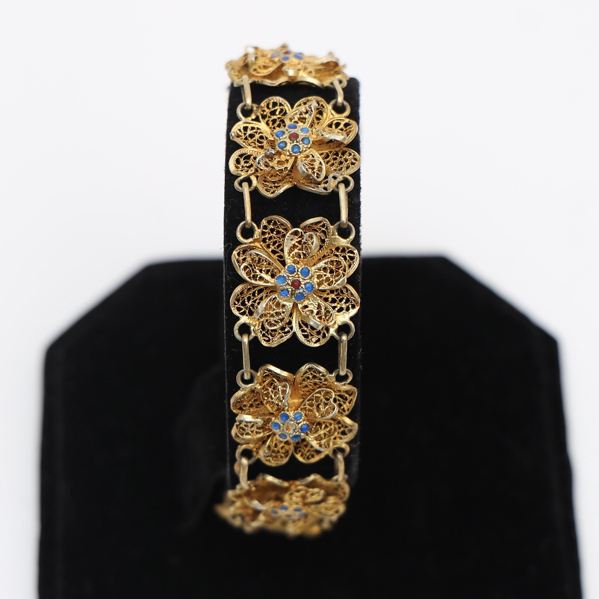 ARMBAND, förgylld metall, med emaljerad dekor.