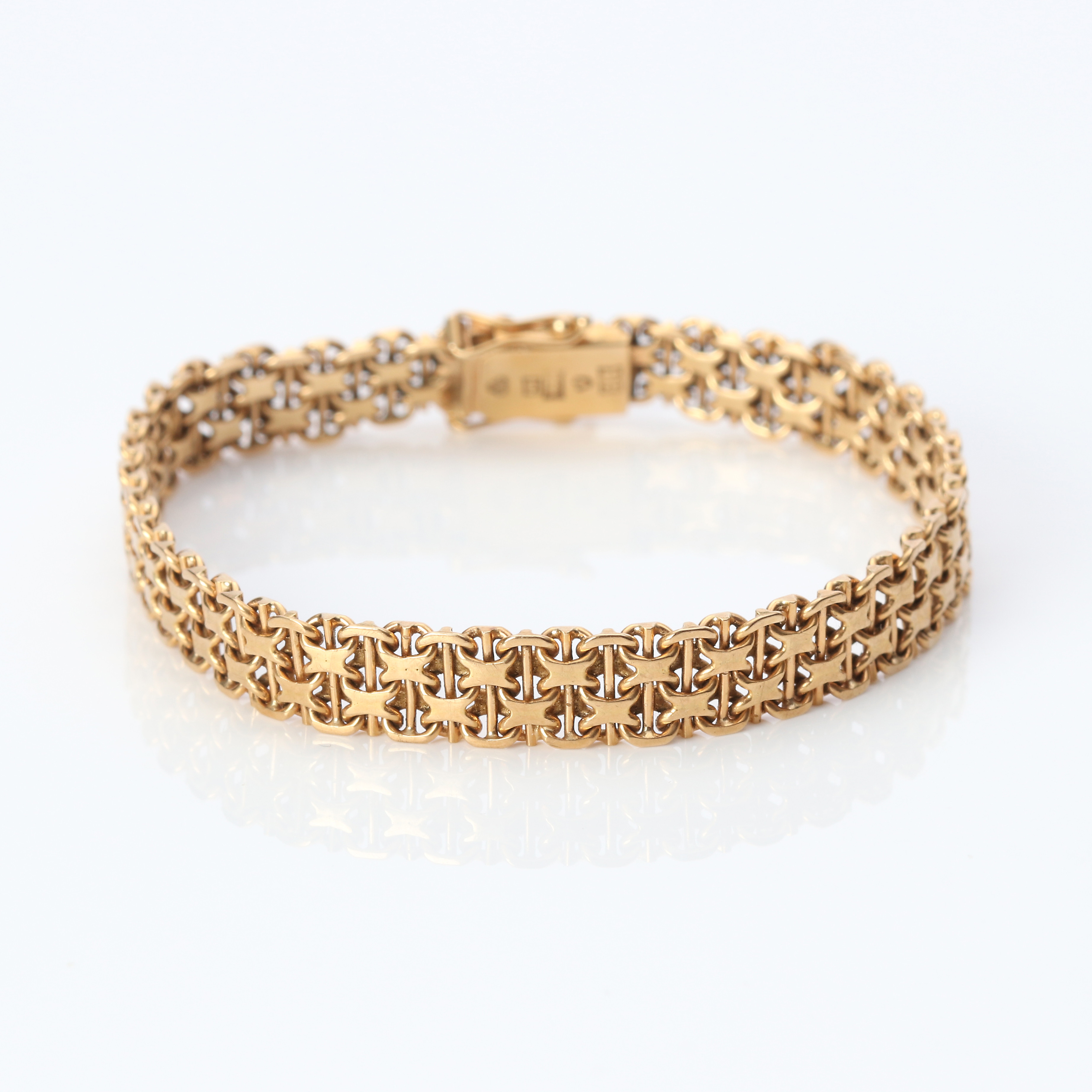 ARMBAND, X-LÄNK. 18k guld, vikt ca 19,5 gram.