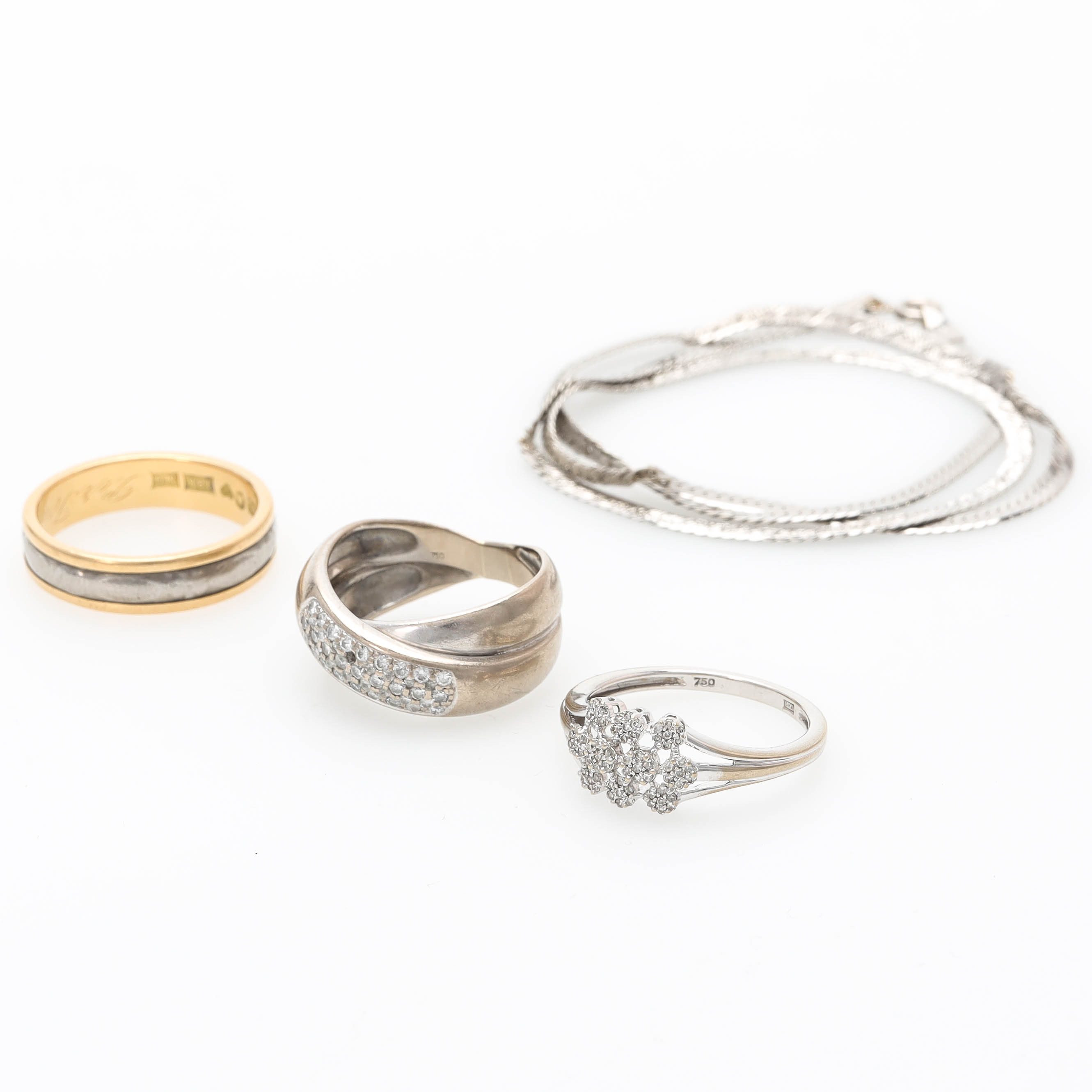 SAMLING SMYCKEN, 4 delar, 18 k guld, vitguld samt monel, vikt 25,4 gram.